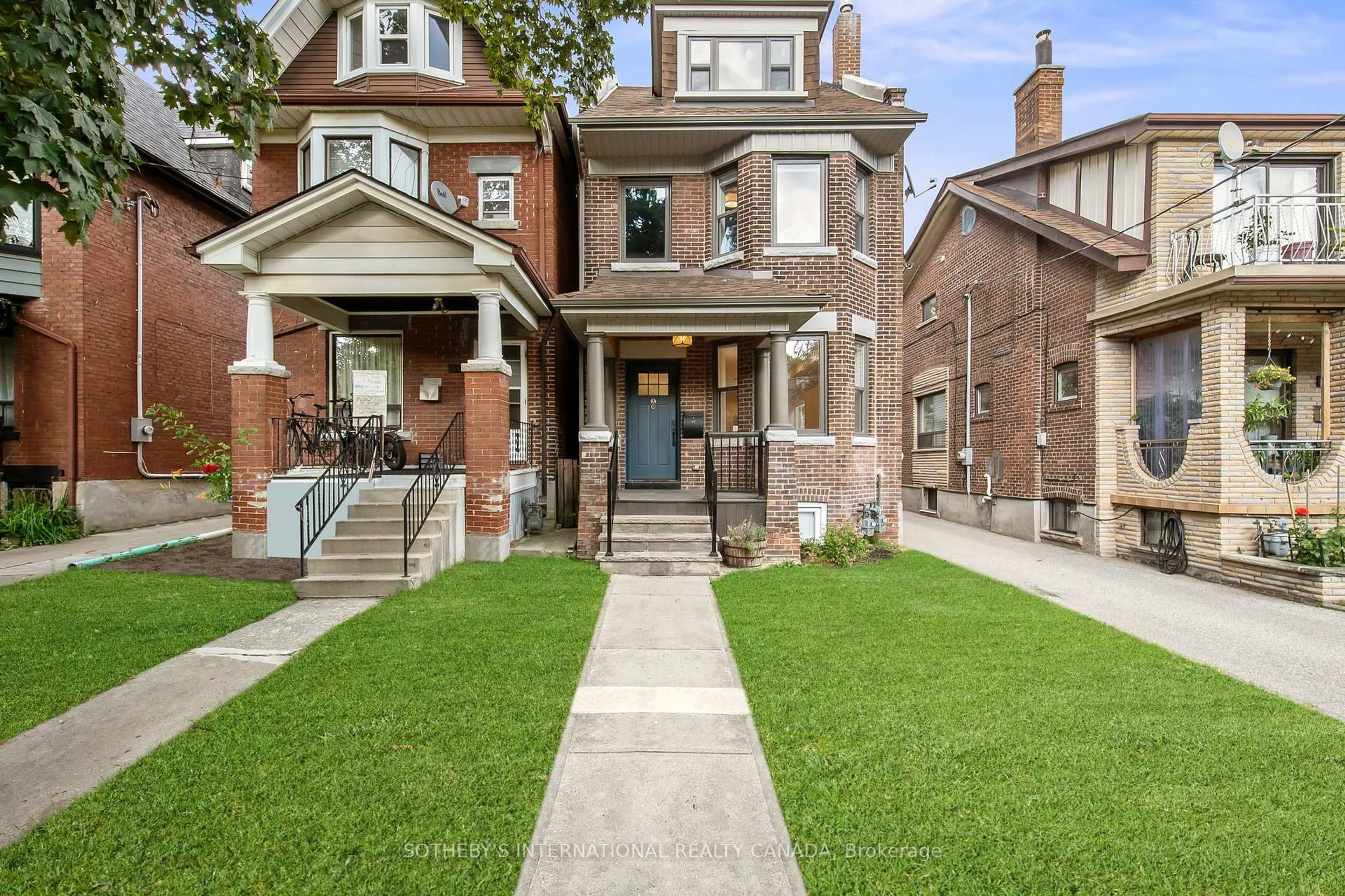 Home with brick exterior material, street for 57 Westmoreland Ave, Toronto Ontario M6H 2Z8