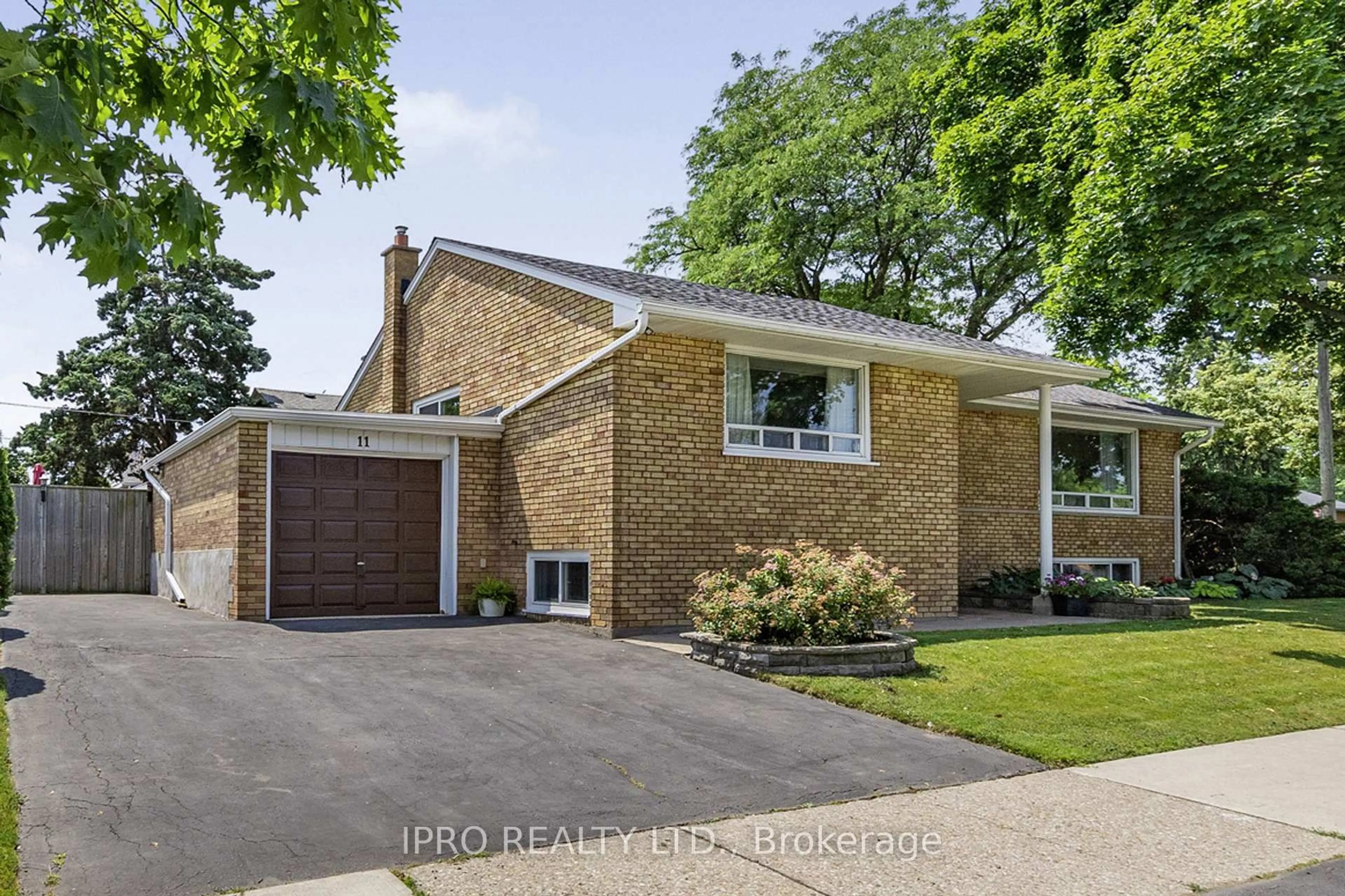 Home with brick exterior material, street for 11 Nugent Rd, Toronto Ontario M9R 1N1