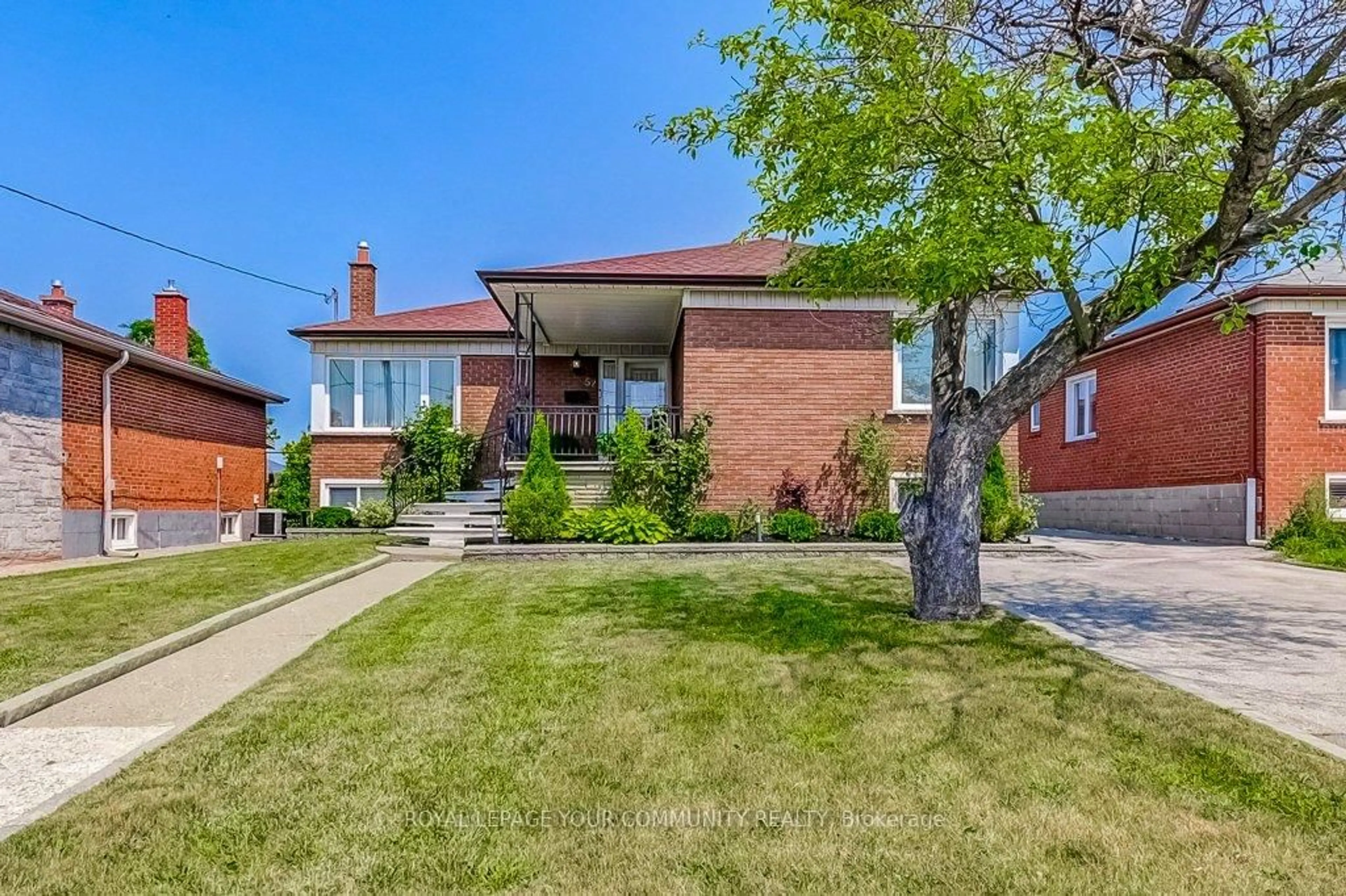 Home with brick exterior material, street for 52 Whitburn Cres, Toronto Ontario M3M 2S4
