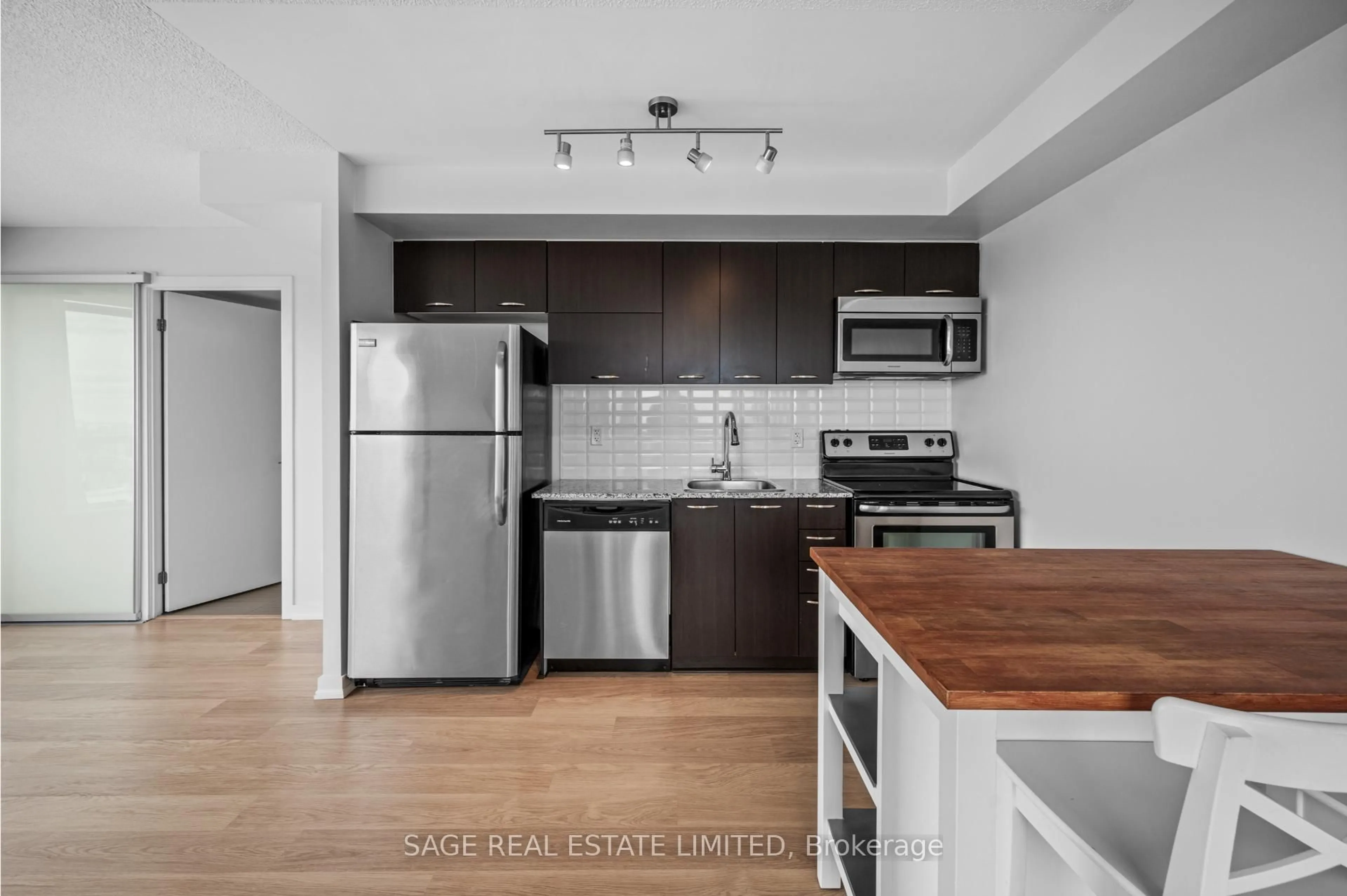 Standard kitchen, wood/laminate floor for 38 Joe Shuster Way #1518, Toronto Ontario M6K 0A5