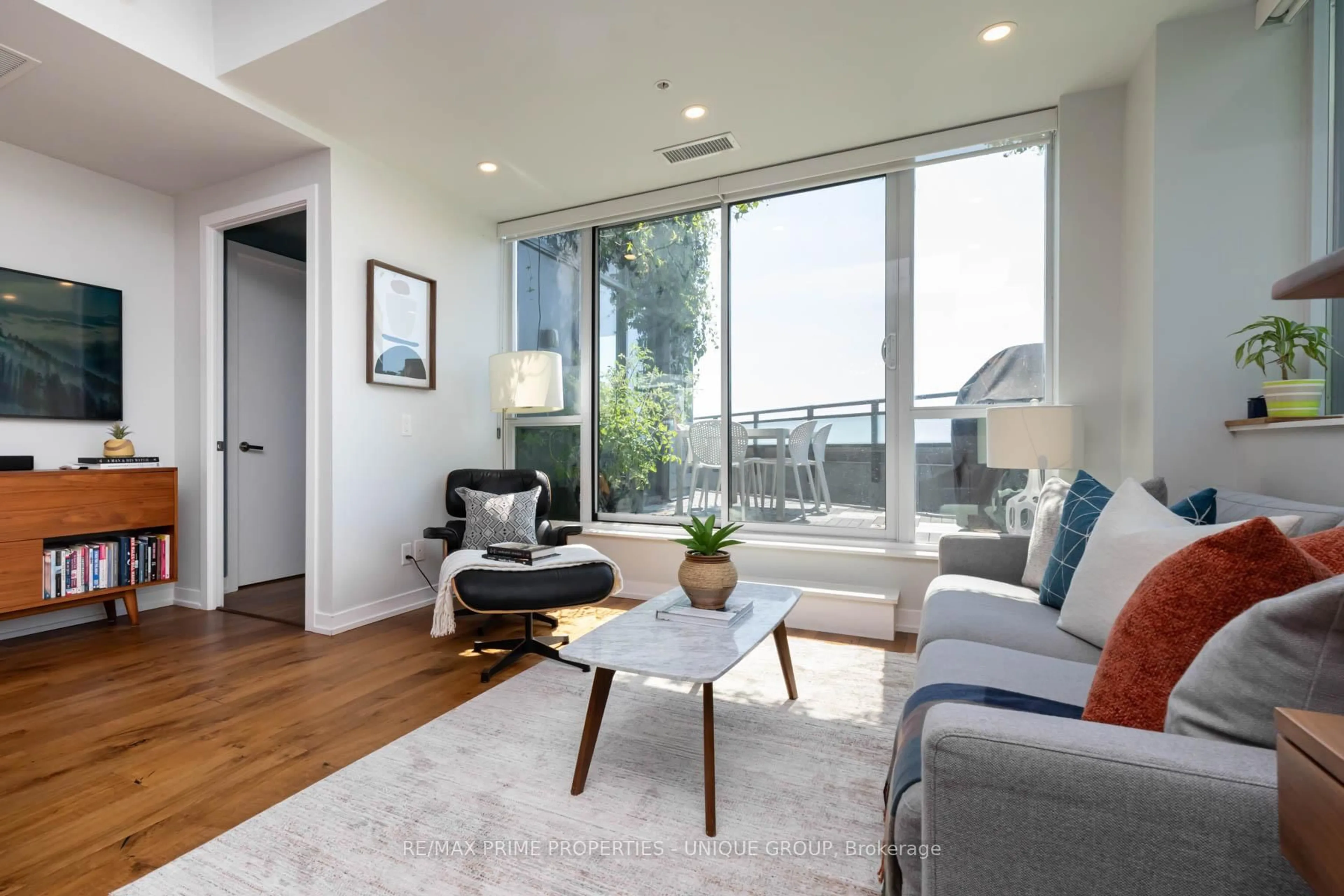 Living room with furniture, wood/laminate floor for 38 Howard Park Ave #618, Toronto Ontario M6R 0A7