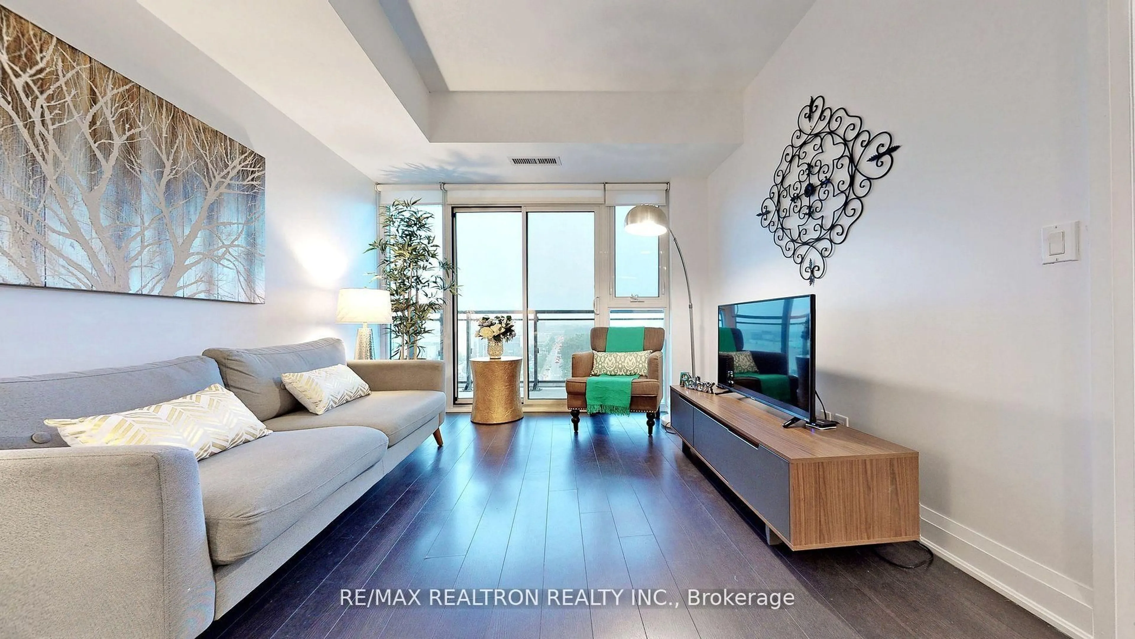 Living room with furniture, wood/laminate floor for 16 Mcadam Ave #801, Toronto Ontario M6A 0B9
