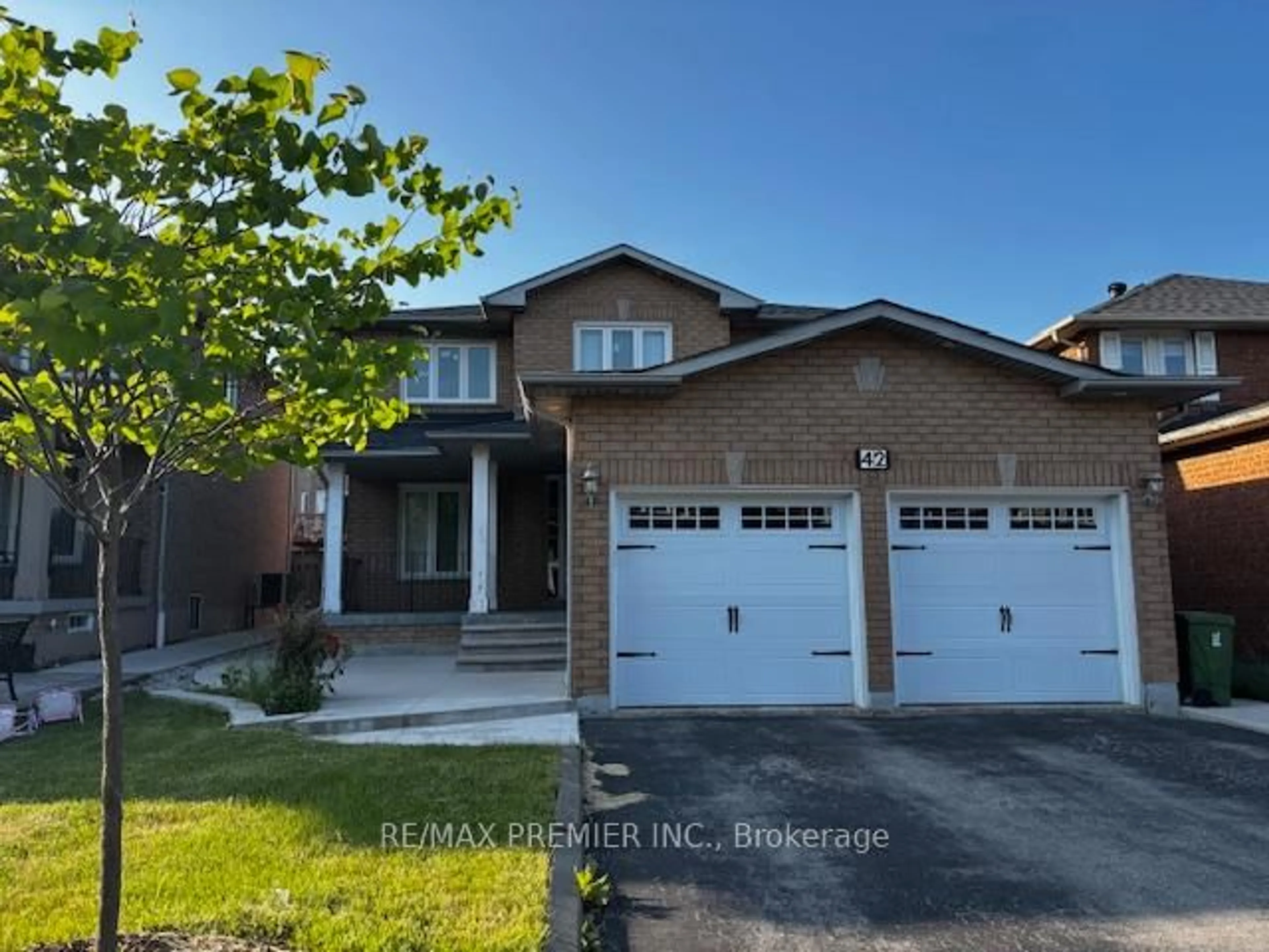 Home with brick exterior material, street for 42 Pinecone Dr, Toronto Ontario M9W 7B6