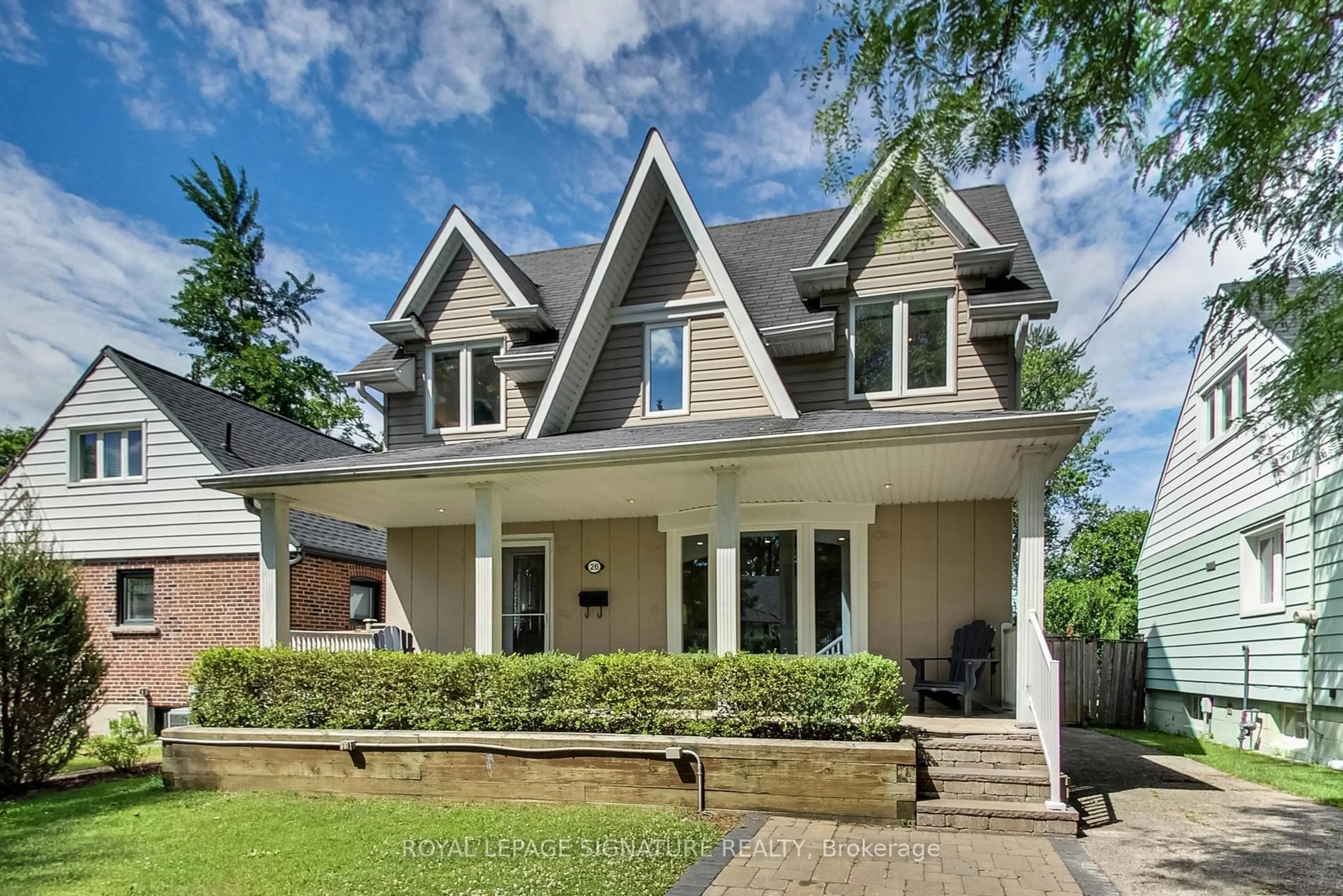 Home with brick exterior material, street for 26 Fulham Dr, Toronto Ontario M8W 4T2