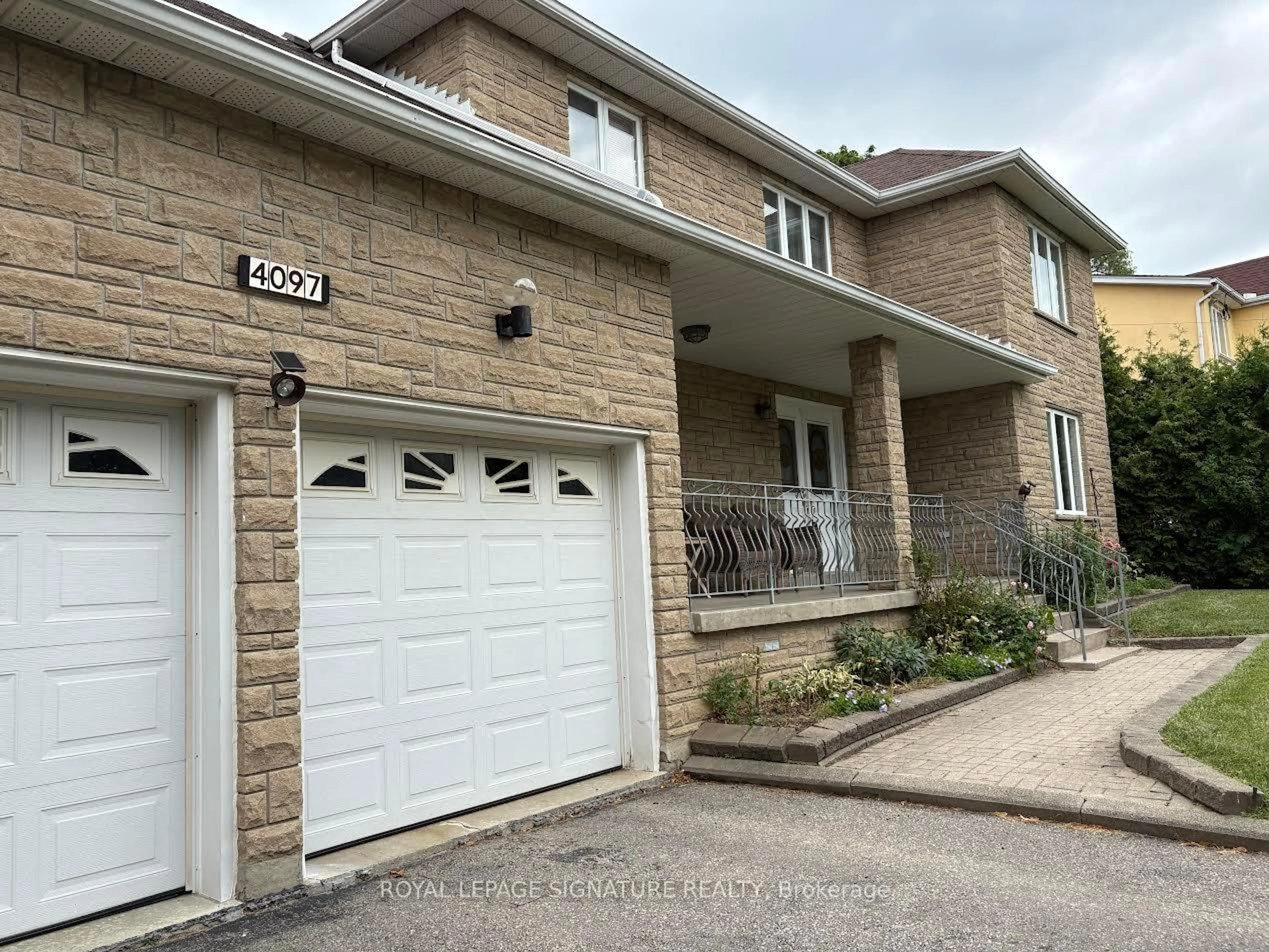 Home with brick exterior material, street for 4097 Hickory Dr, Mississauga Ontario L4W 1L1