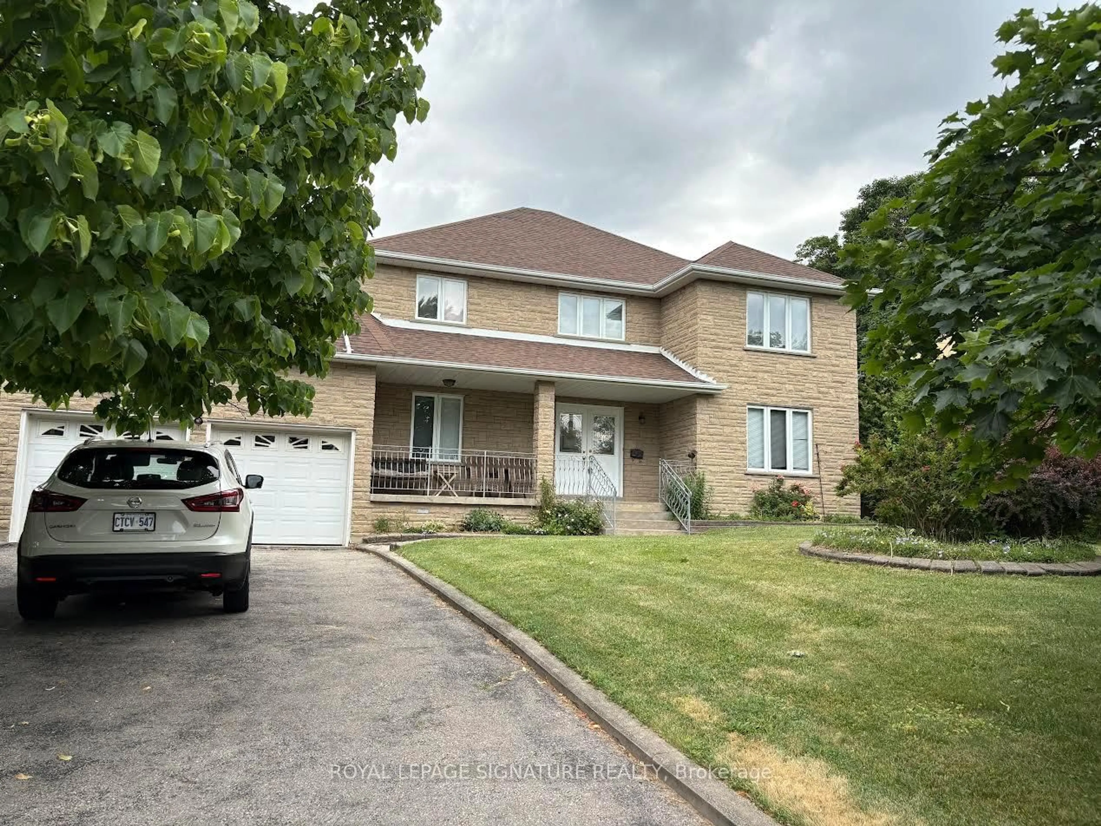 Home with brick exterior material, street for 4097 Hickory Dr, Mississauga Ontario L4W 1L1