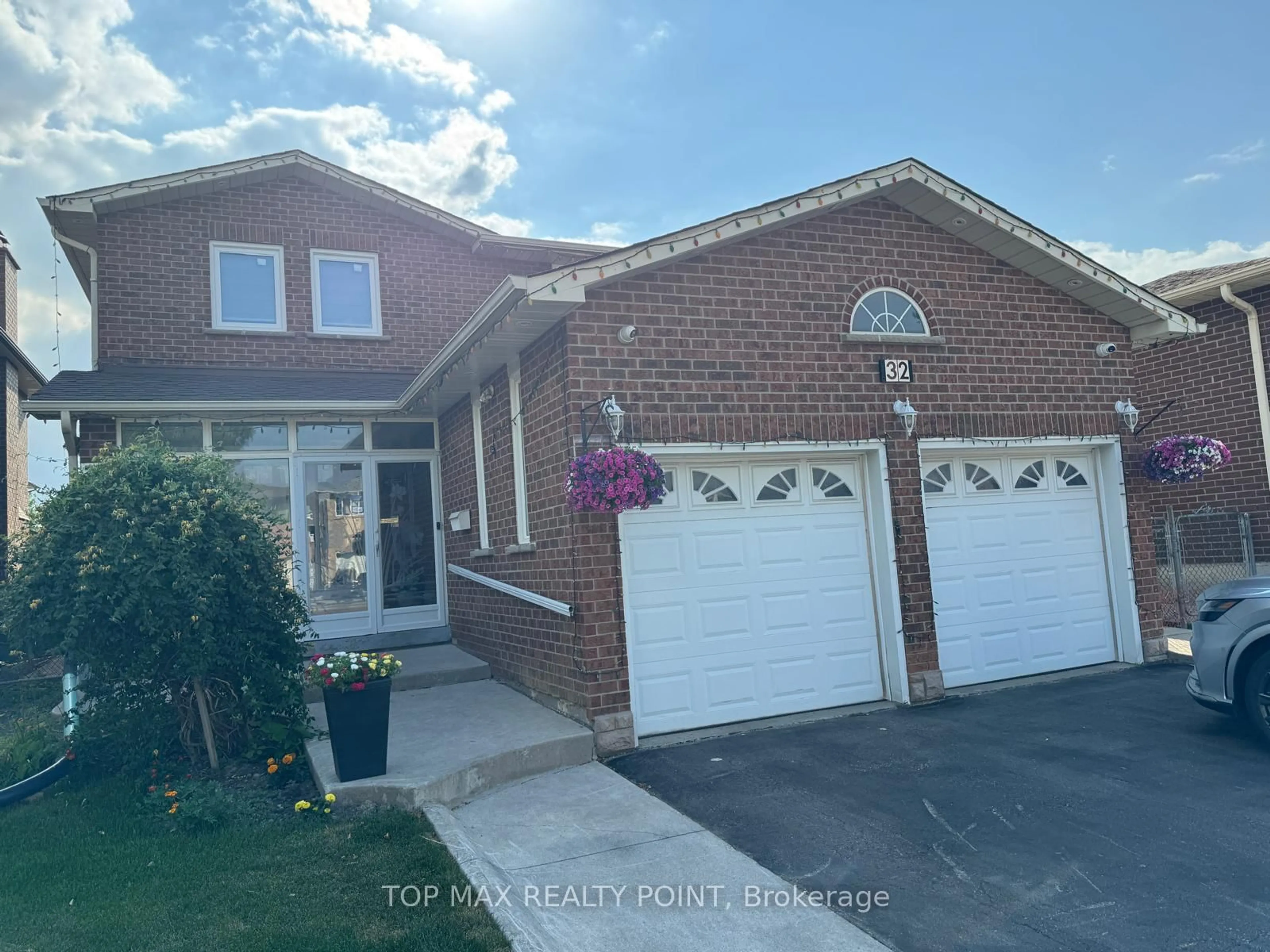 Home with brick exterior material, street for 32 Gihon Spring Dr, Toronto Ontario M9V 4X9
