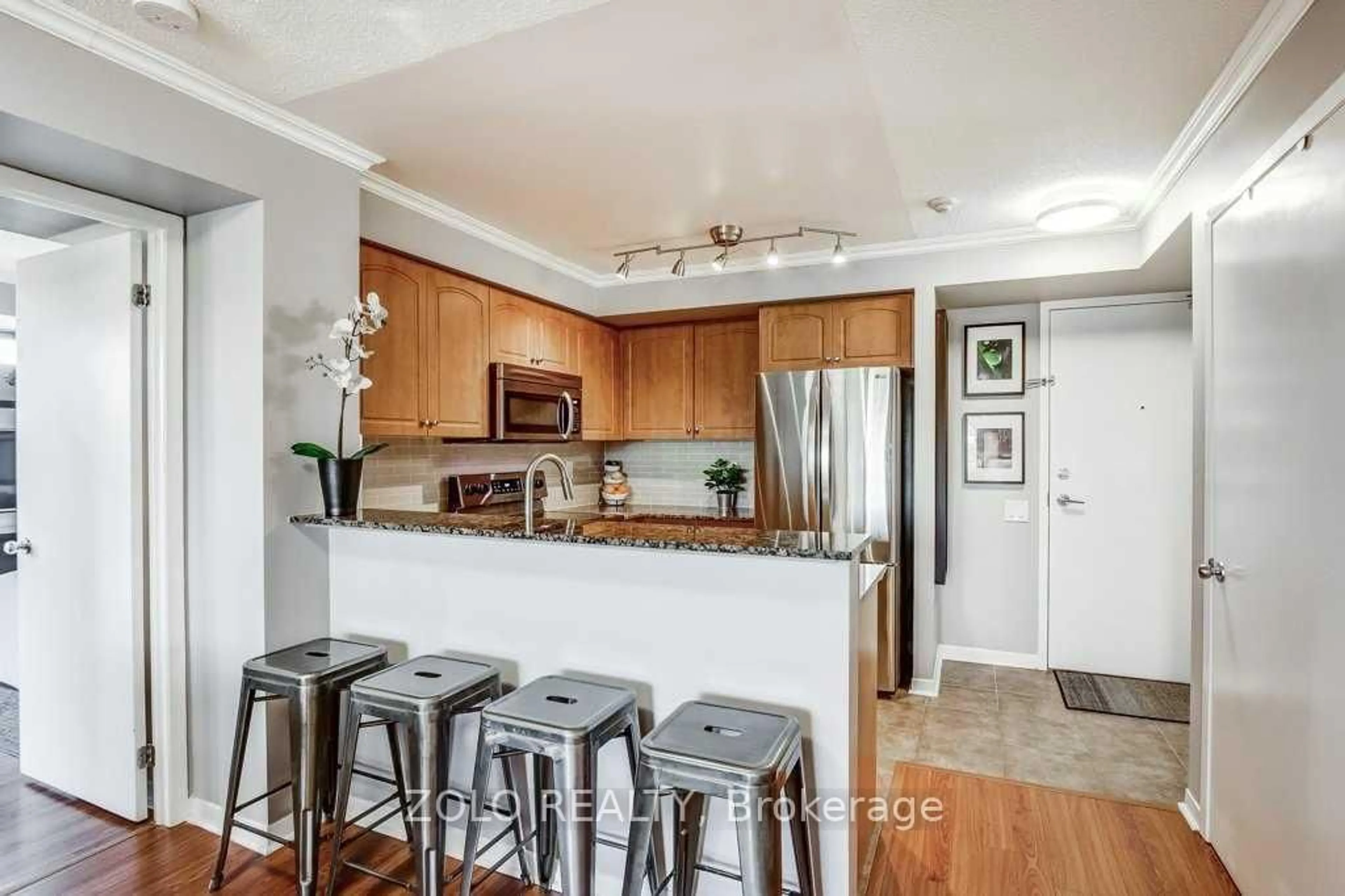 Open concept kitchen, ceramic/tile floor for 1040 The Queensway St #409, Toronto Ontario M8Z 0A7