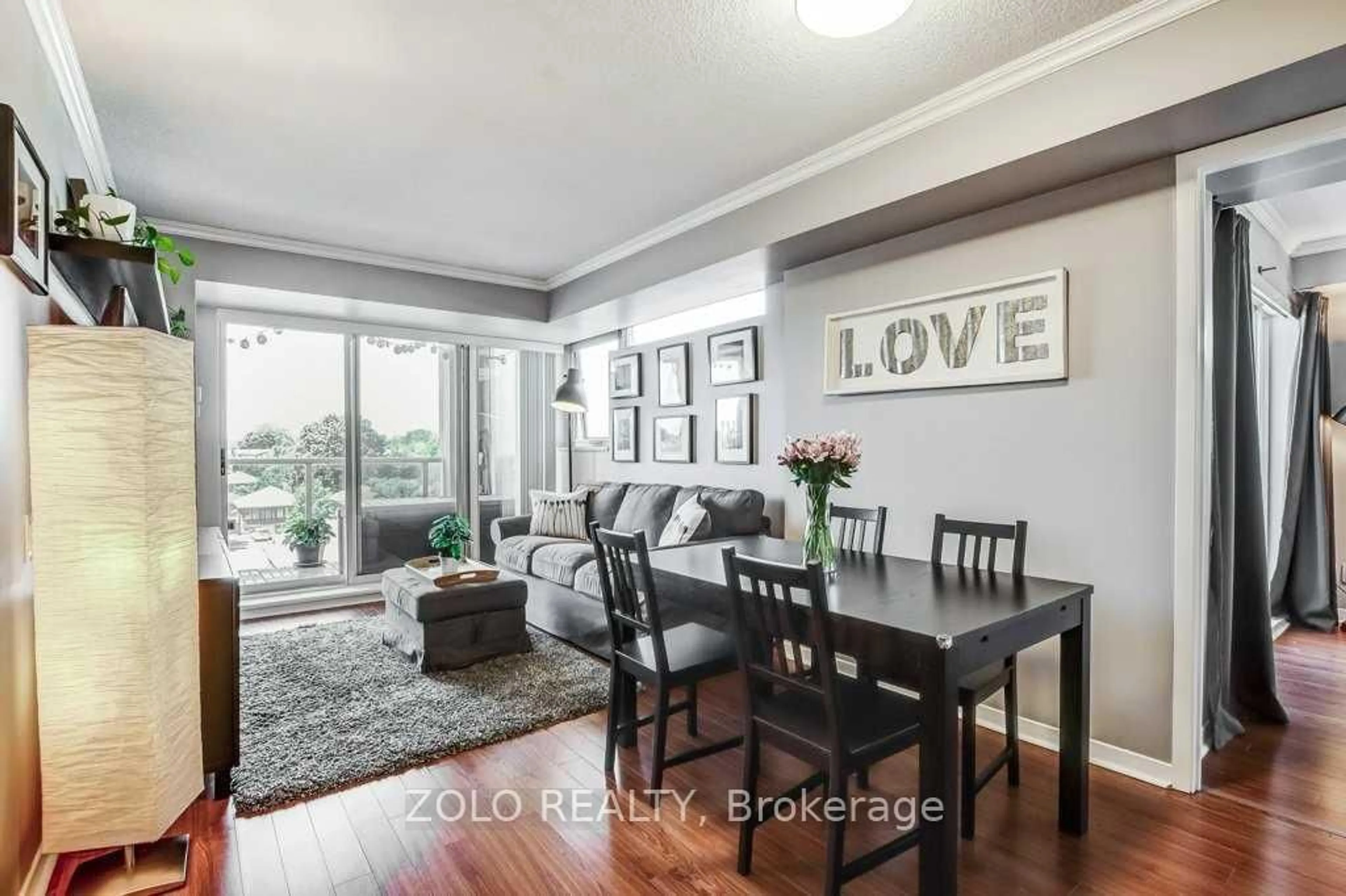 Living room with furniture, wood/laminate floor for 1040 The Queensway St #409, Toronto Ontario M8Z 0A7