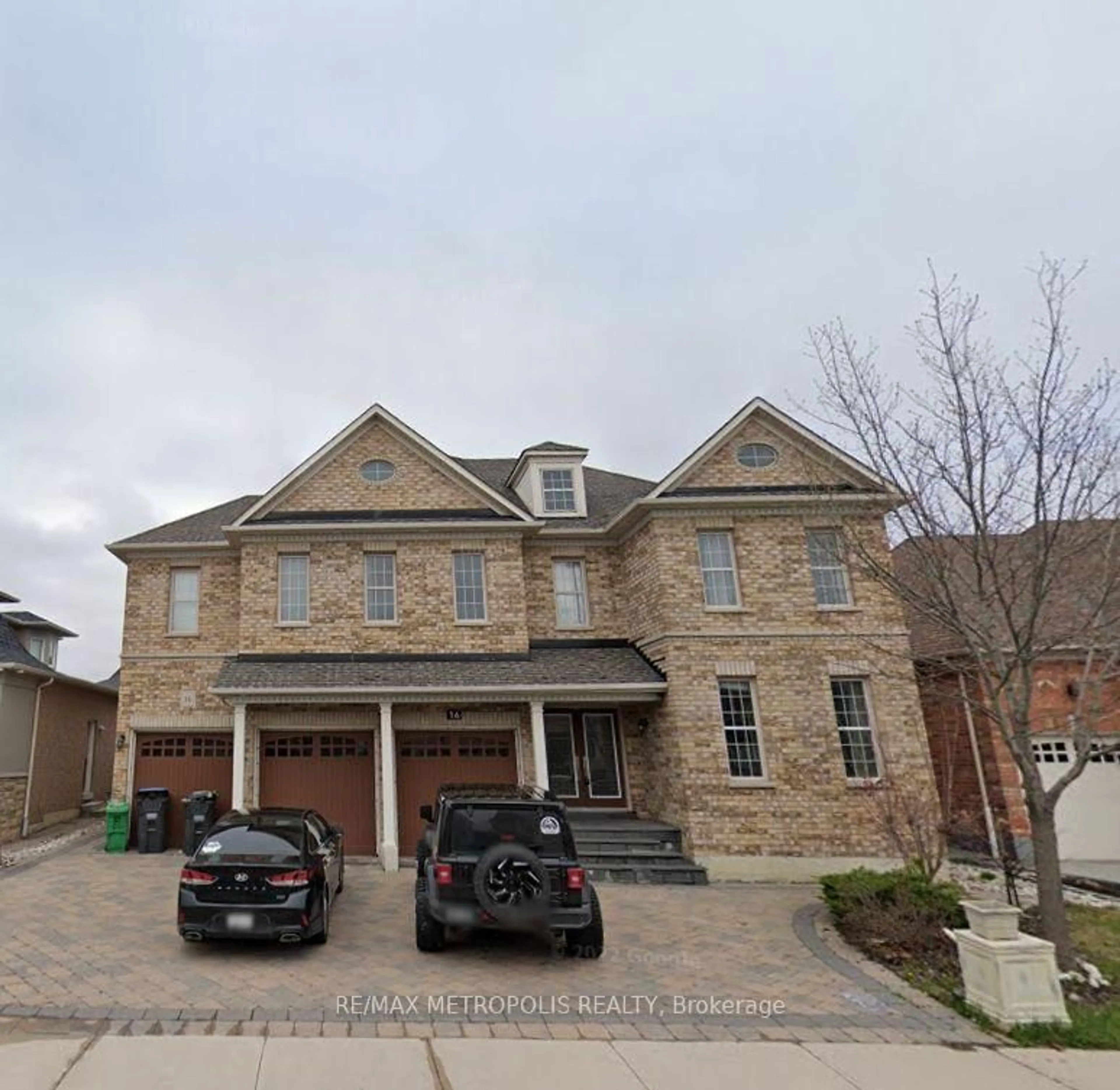Home with brick exterior material, street for 16 Eiffel Blvd, Brampton Ontario L6P 1V9
