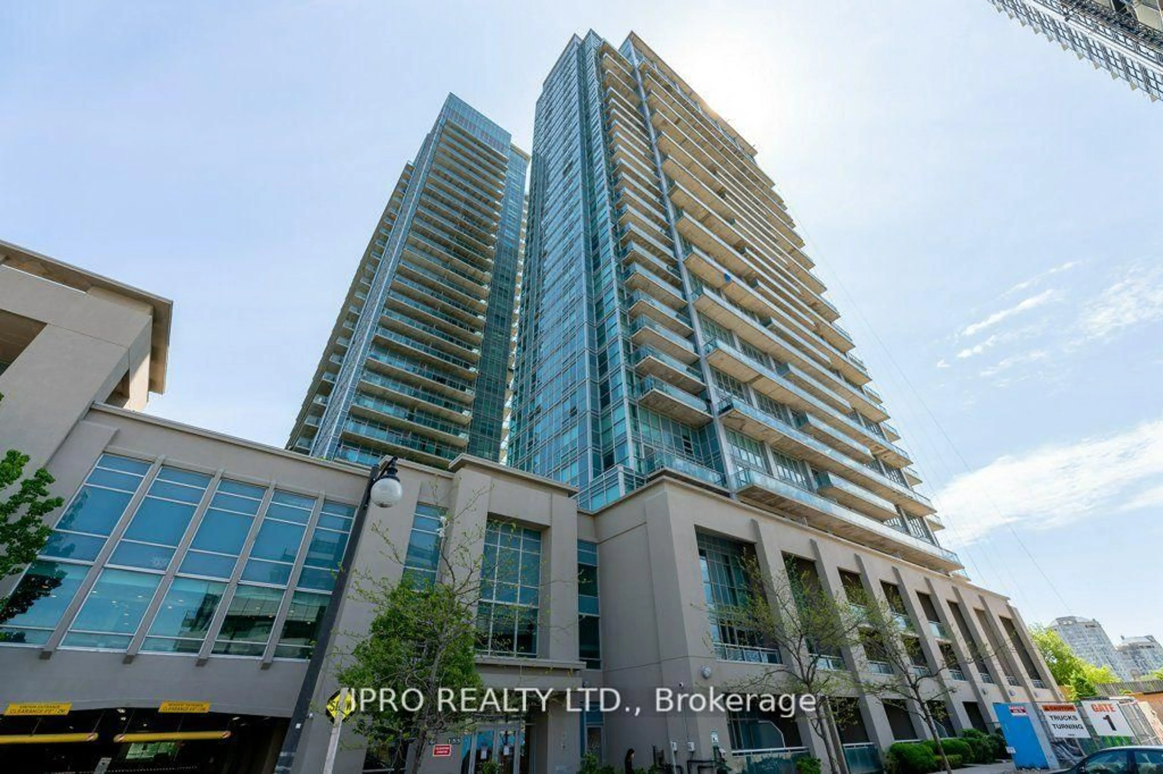 A pic from outside/outdoor area/front of a property/back of a property/a pic from drone, building for 155 Legion Rd #408, Toronto Ontario M8Y 0A7