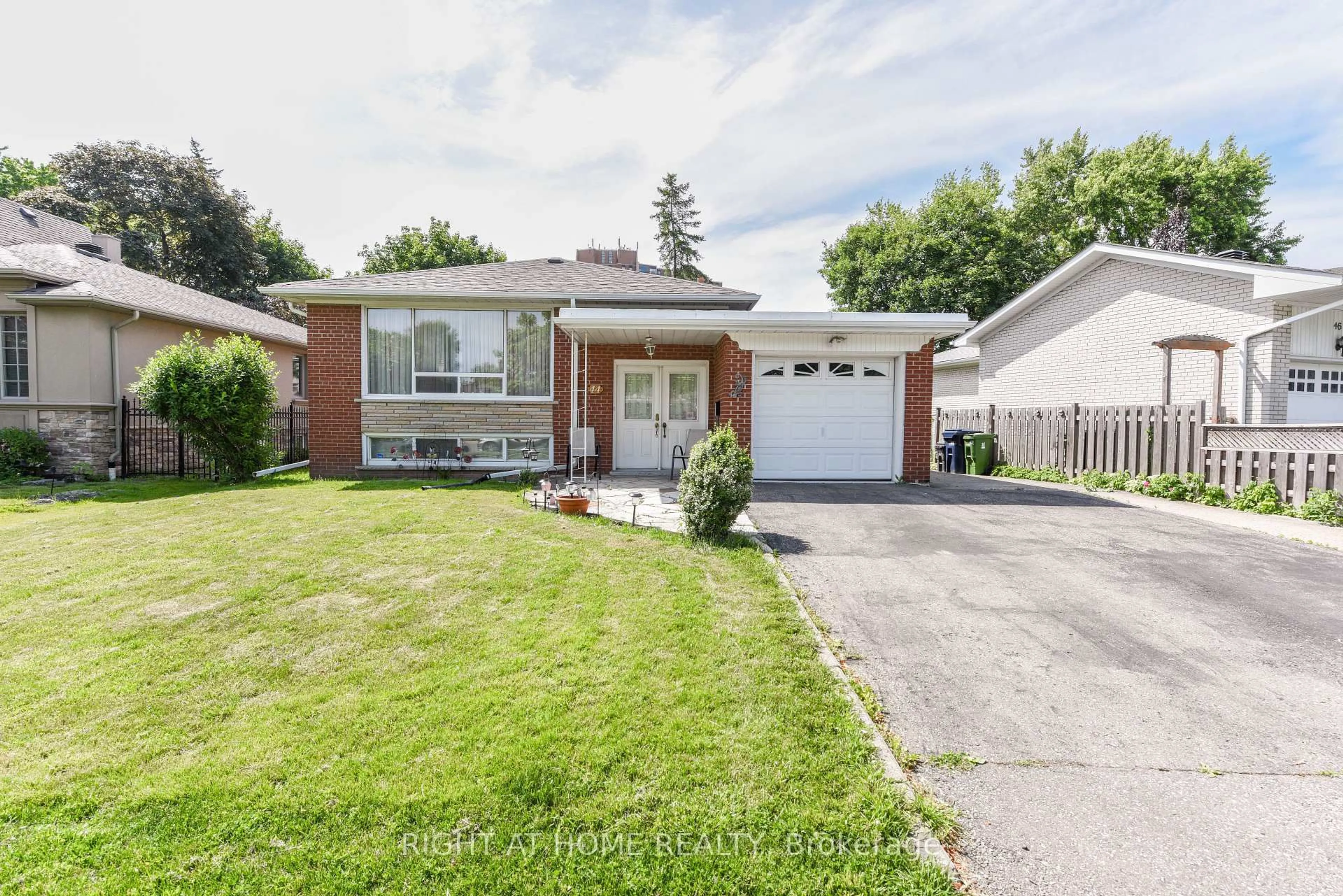Home with brick exterior material, street for 44 Birgitta Cres, Toronto Ontario M9C 3W4