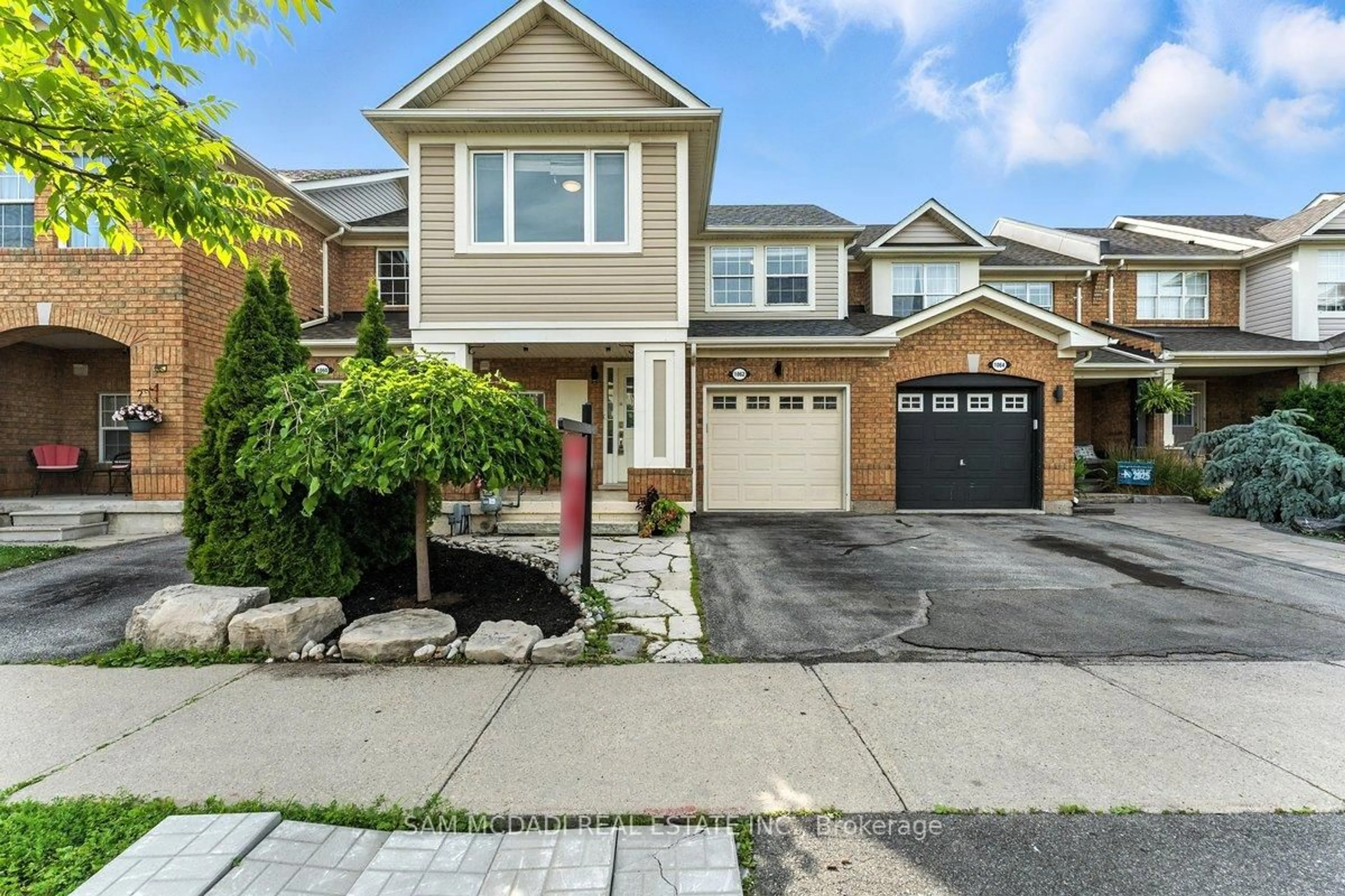 Home with vinyl exterior material, street for 1062 Cooper Ave, Milton Ontario L9T 5W6