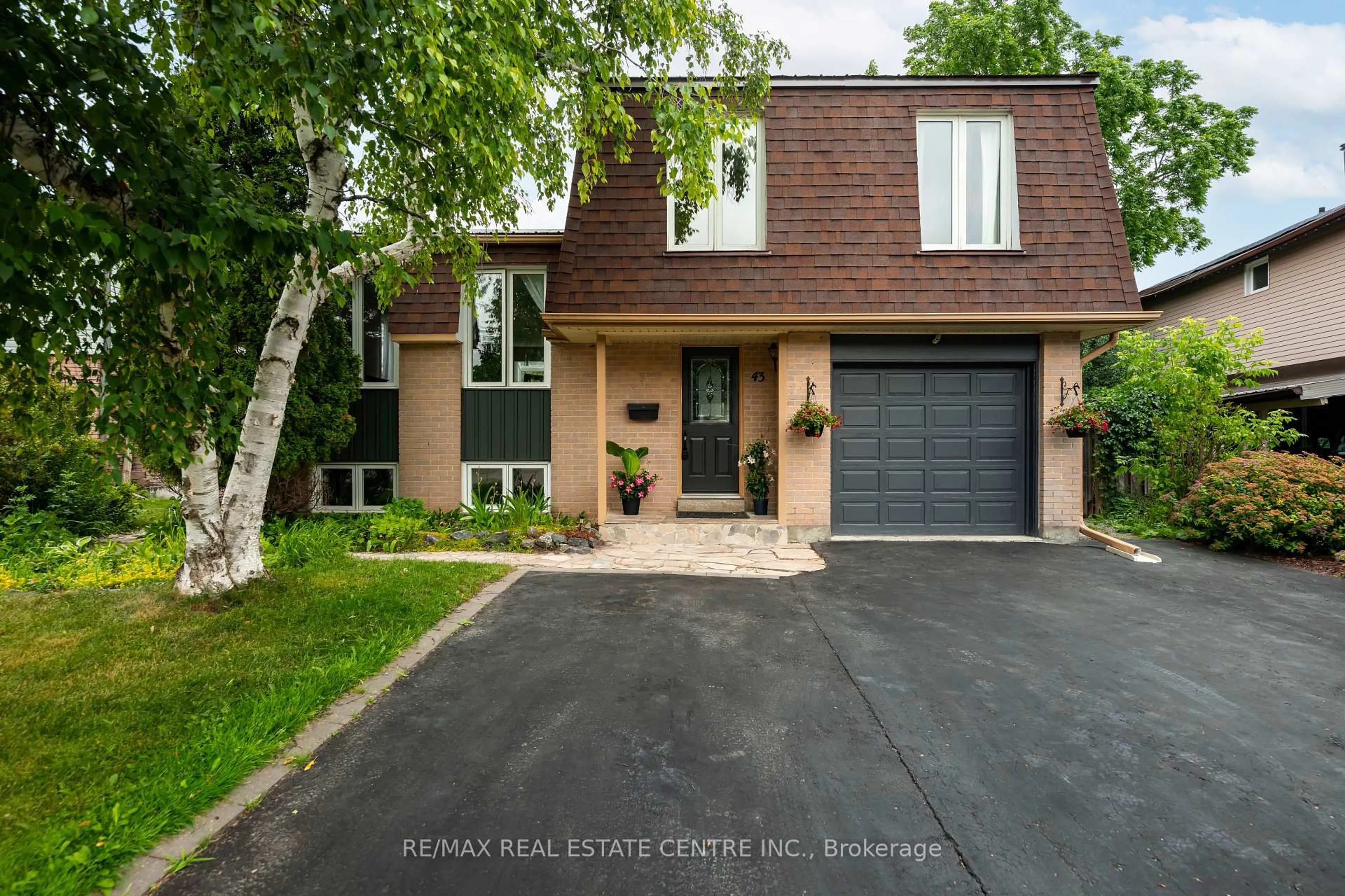 Home with brick exterior material, street for 43 Brenda Blvd, Orangeville Ontario L9W 3L3