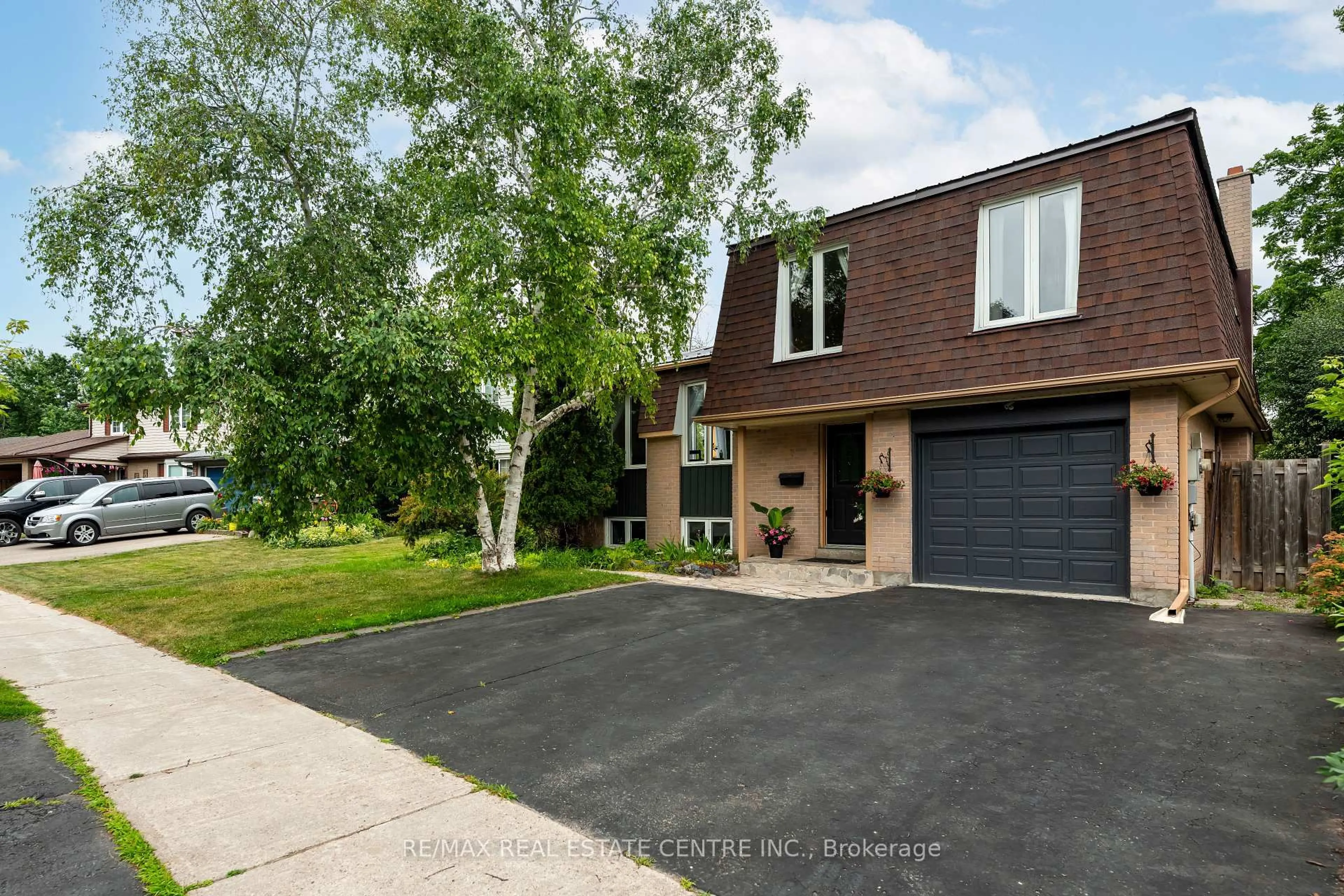Home with brick exterior material, street for 43 Brenda Blvd, Orangeville Ontario L9W 3L3