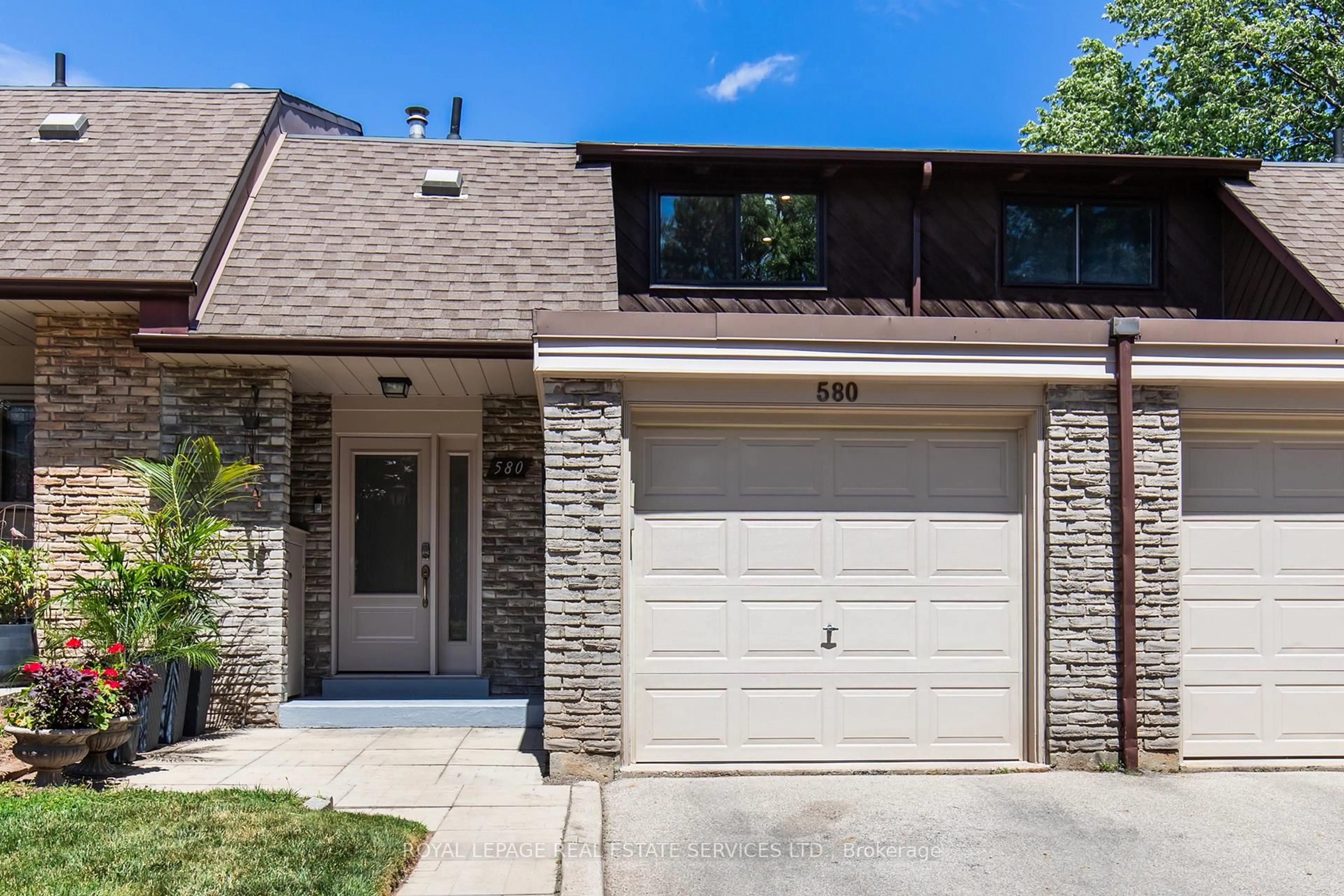 Home with brick exterior material, street for 580 Forestwood Cres #32, Burlington Ontario L7L 4K3