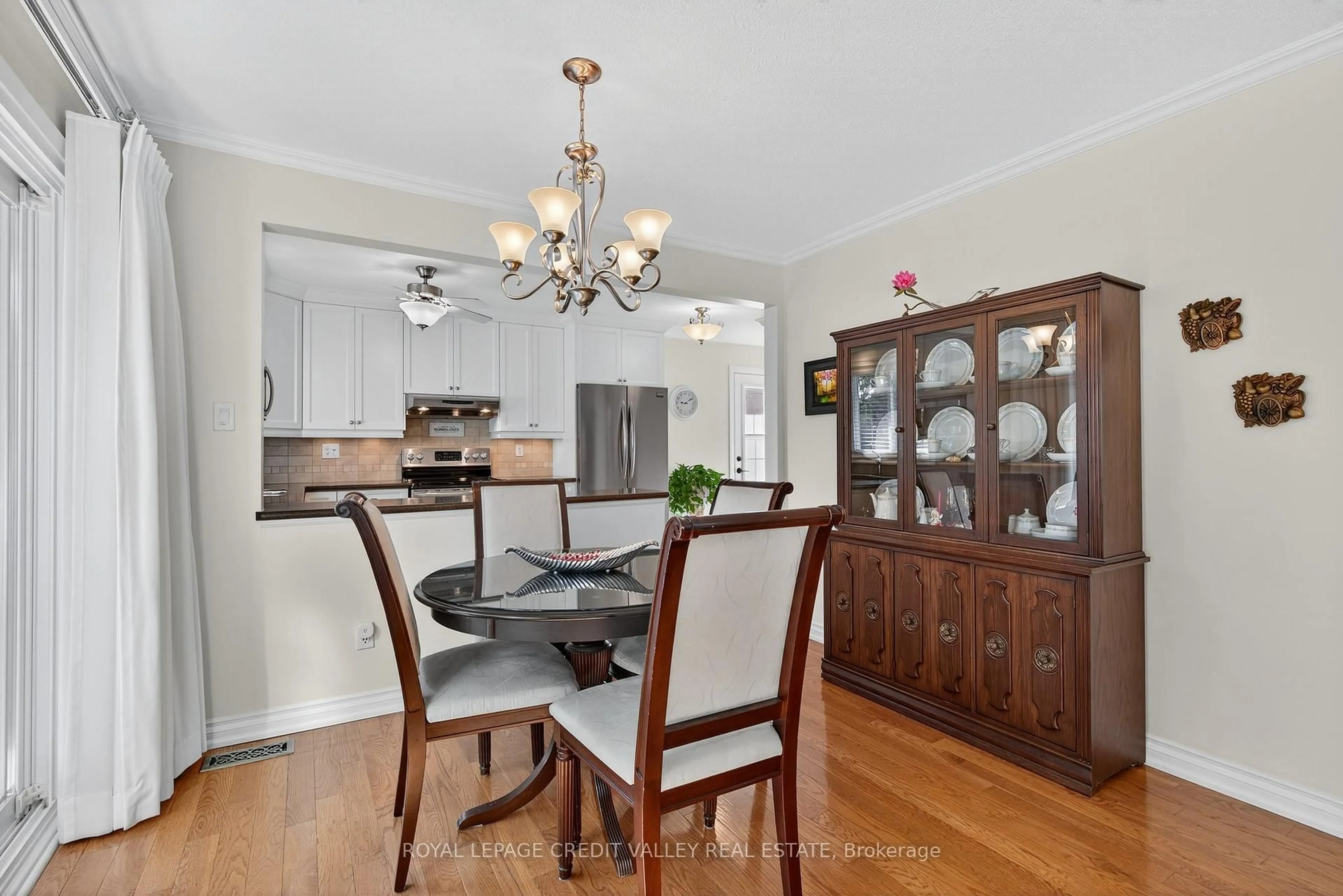 Dining room, wood/laminate floor for 28 Palgrave Cres, Brampton Ontario L6W 1C9