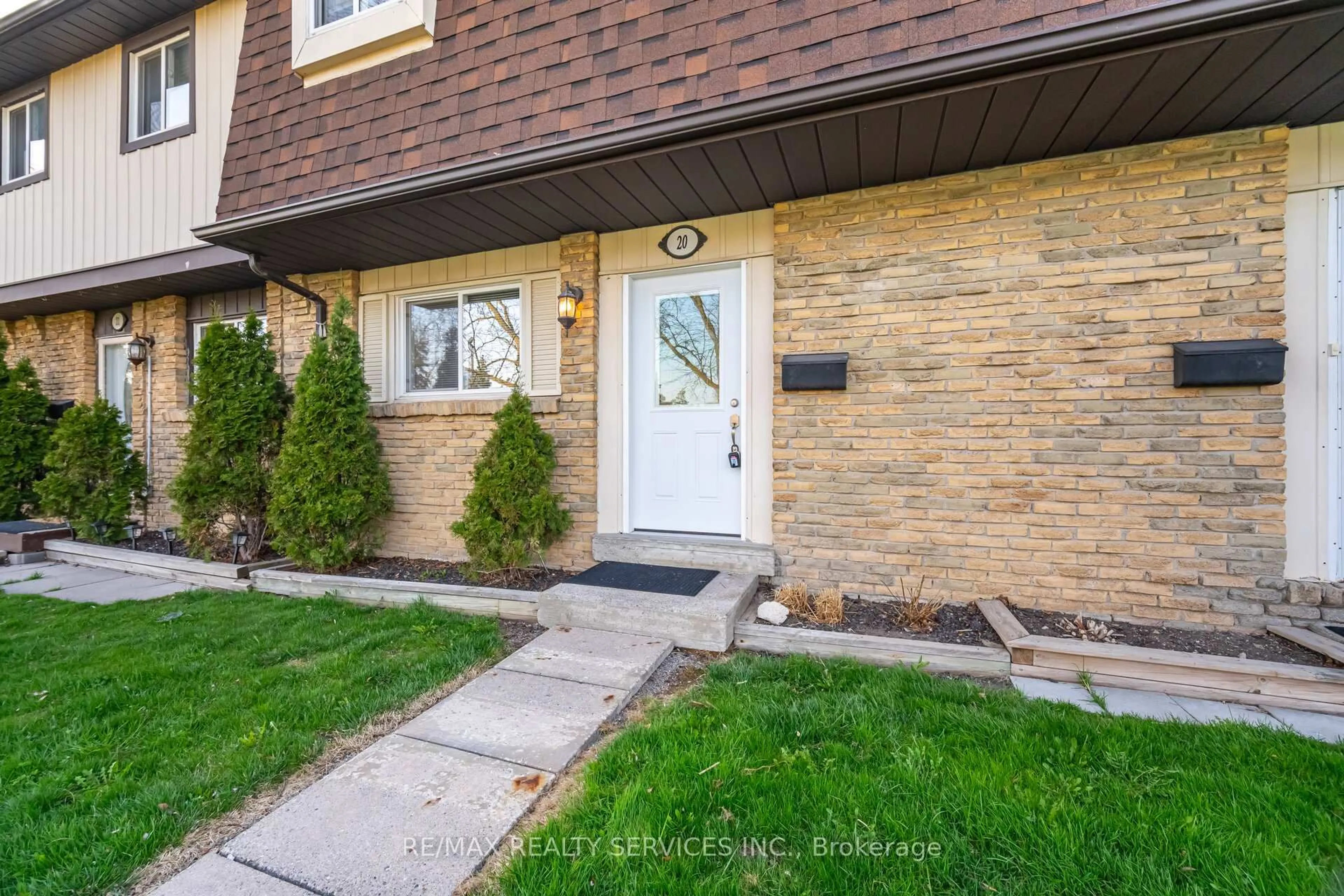 Home with brick exterior material, street for 93 Hansen Rd #20, Brampton Ontario L6V 3C8