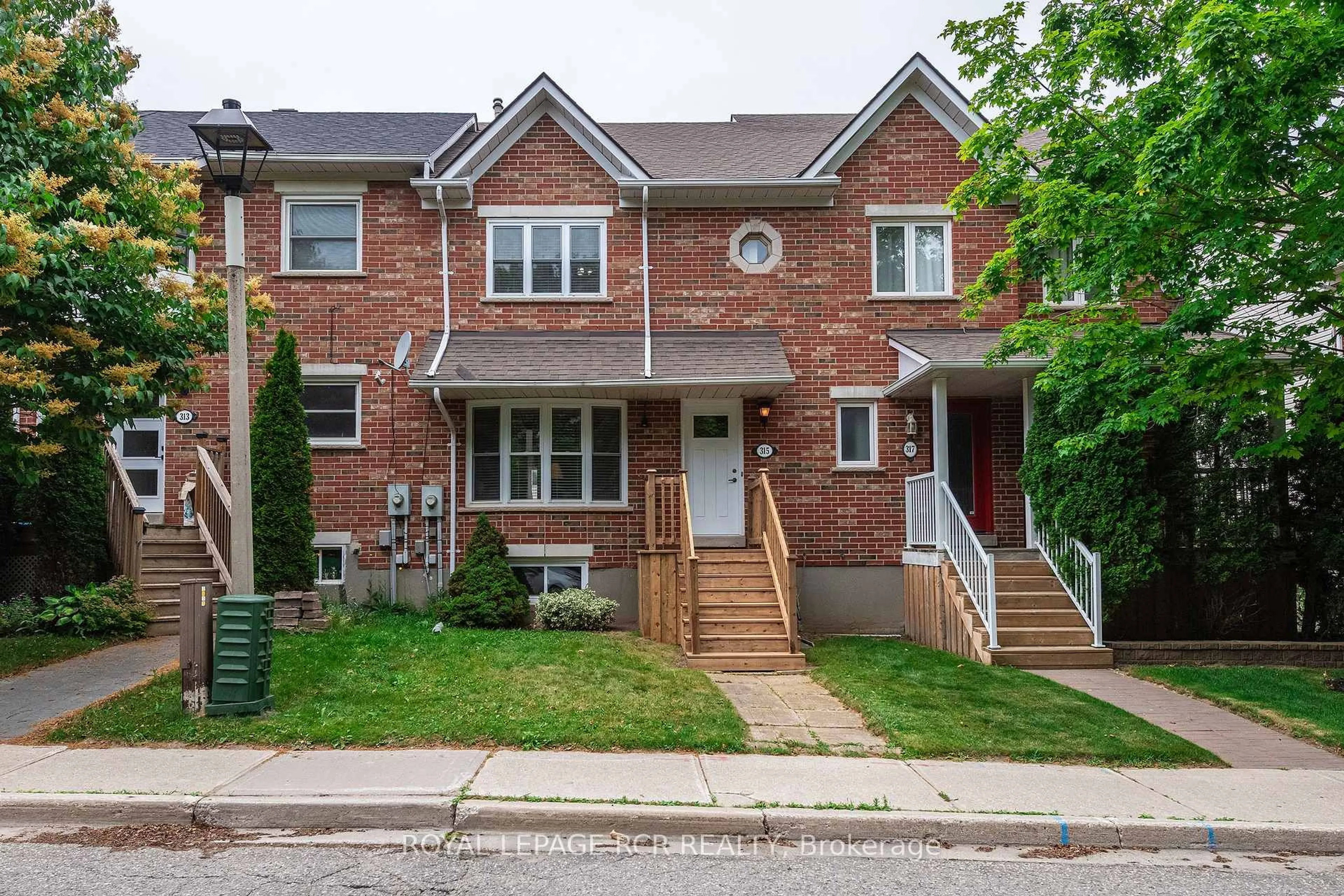 Home with brick exterior material, street for 315 Cottonwood St, Orangeville Ontario L9W 4X7