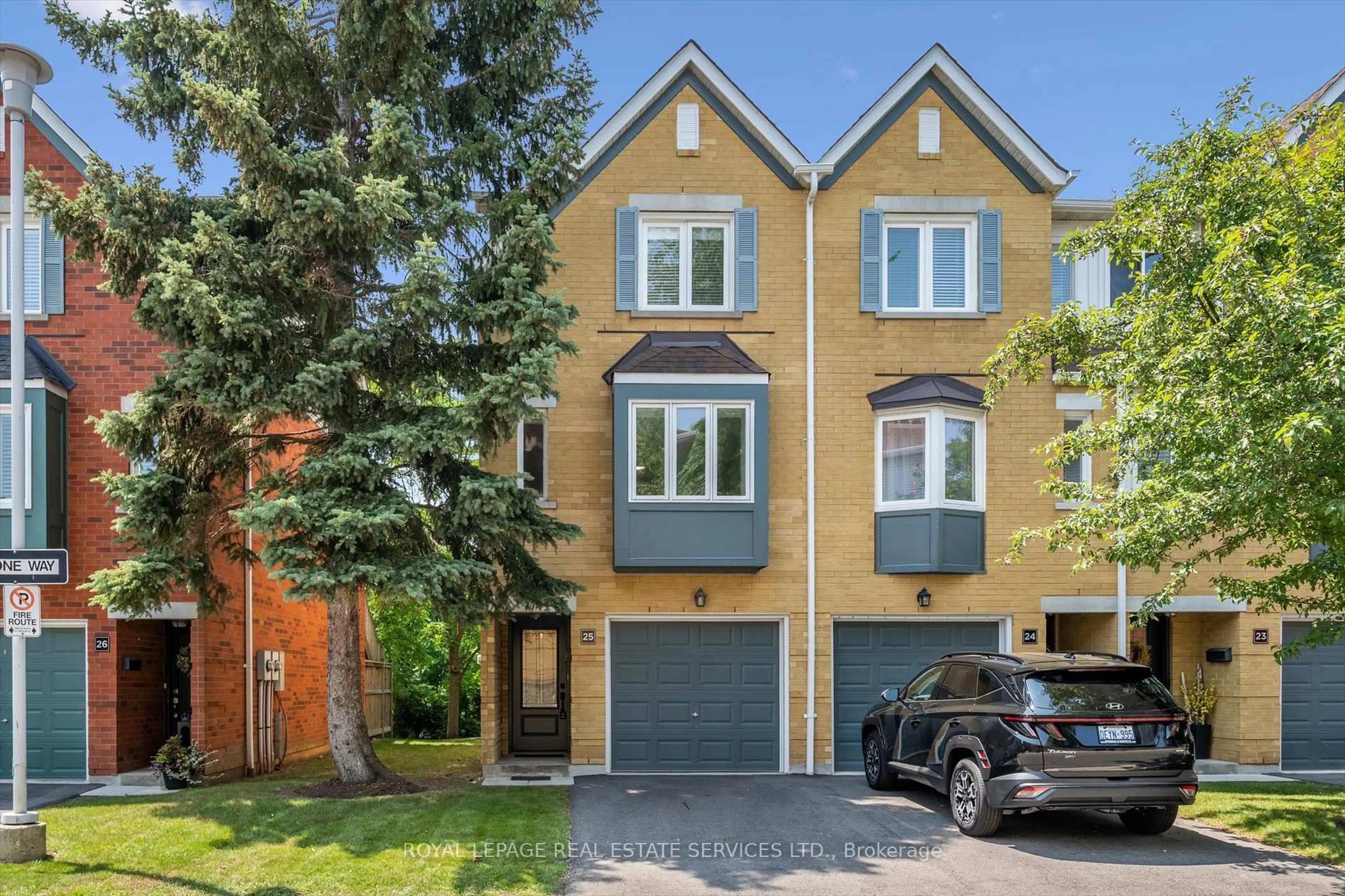 Home with brick exterior material, street for 2300 Brays Lane #25, Oakville Ontario L6M 3J9