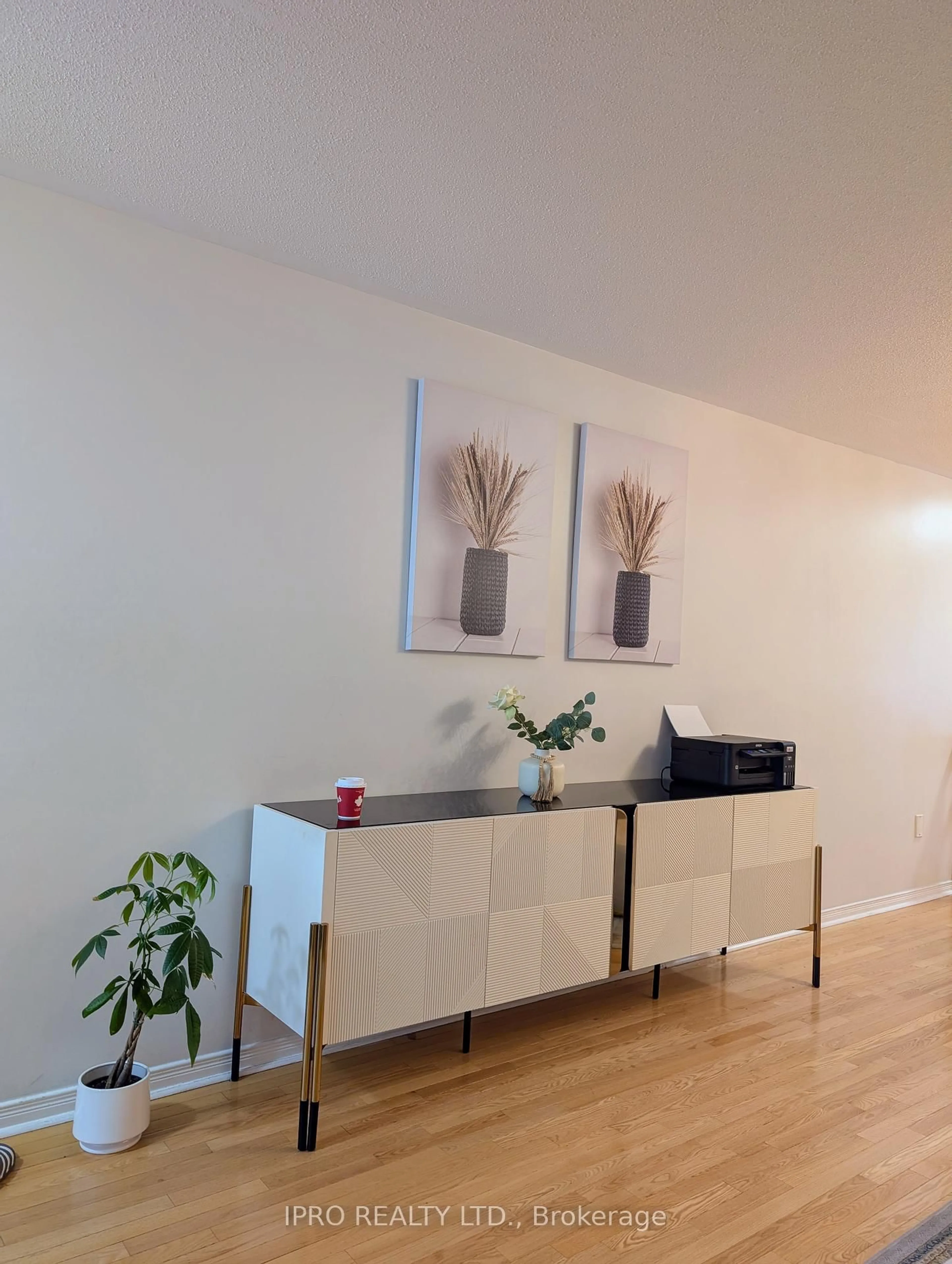 Living room with furniture, wood/laminate floor for 10 Polar Bear Pl, Brampton Ontario L6R 3L7