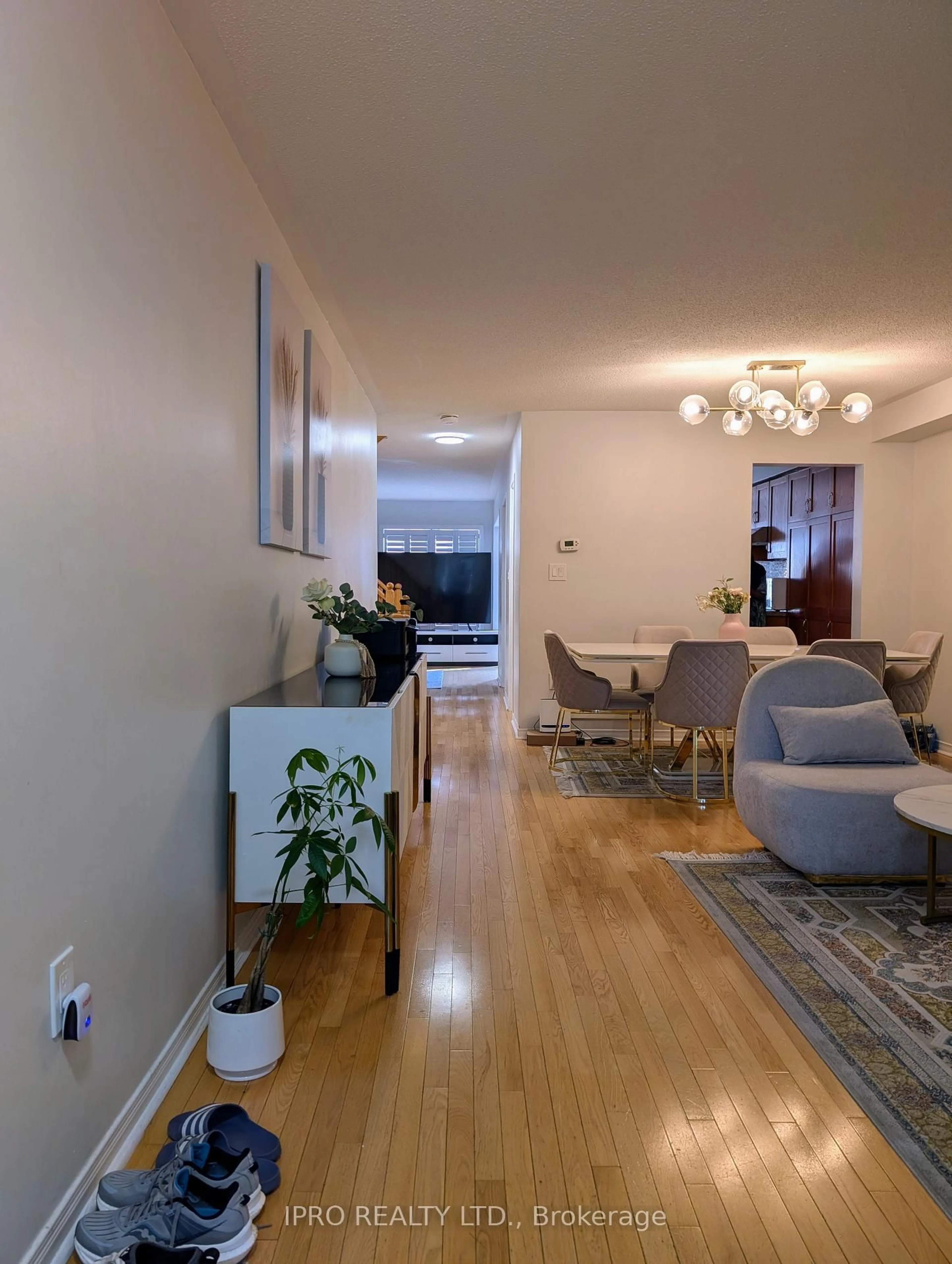 Living room with furniture, wood/laminate floor for 10 Polar Bear Pl, Brampton Ontario L6R 3L7