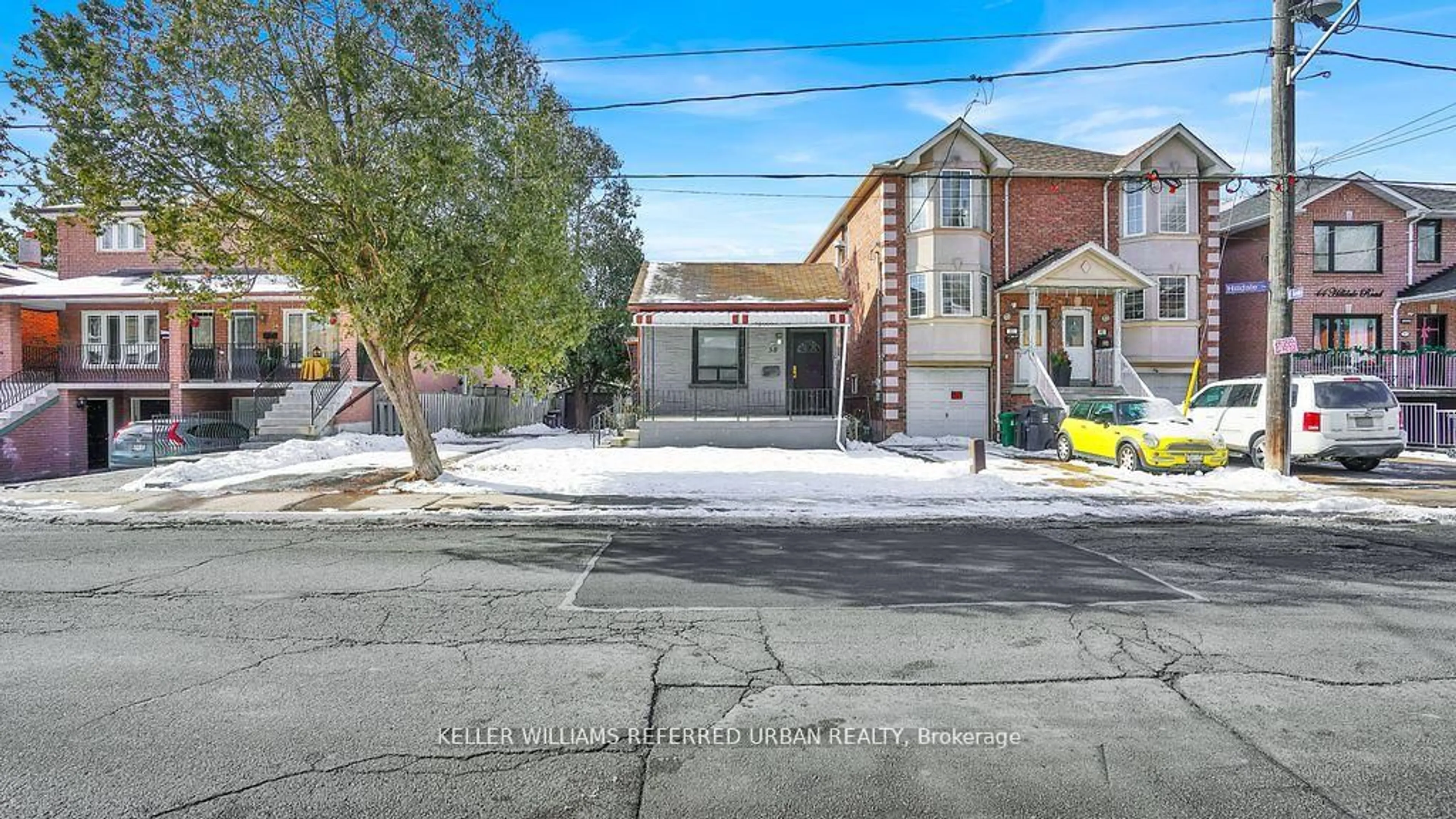 A pic from outside/outdoor area/front of a property/back of a property/a pic from drone, street for 38 Hilldale Rd, Toronto Ontario M6N 3Y2