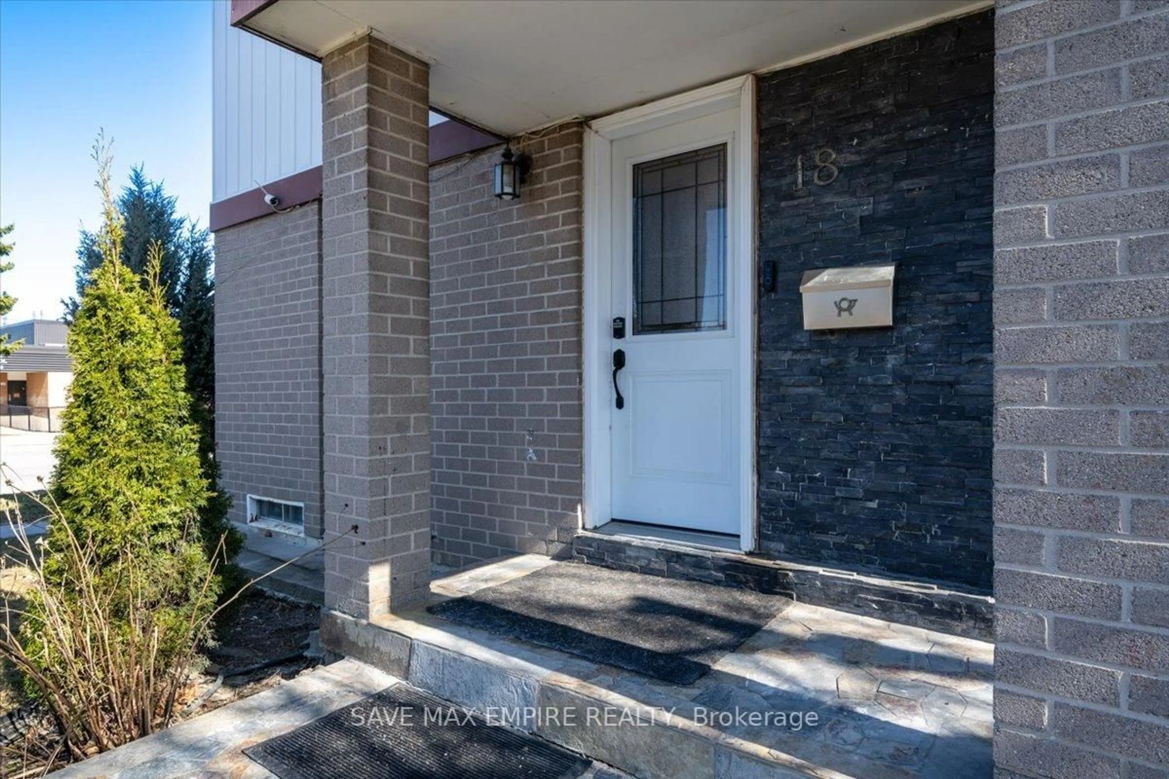 Home with brick exterior material, street for 18 Hasting Sq, Brampton Ontario L6S 2N8