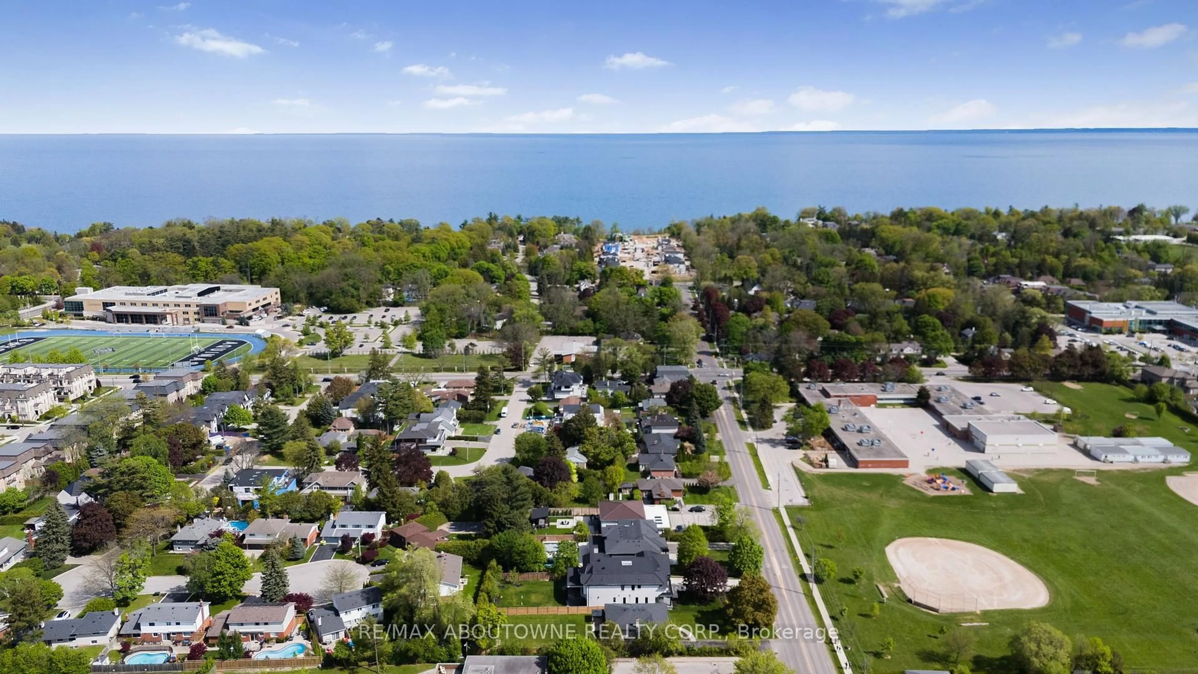 A pic from outside/outdoor area/front of a property/back of a property/a pic from drone, water/lake/river/ocean view for 215 Morden Rd, Oakville Ontario L6K 2S2