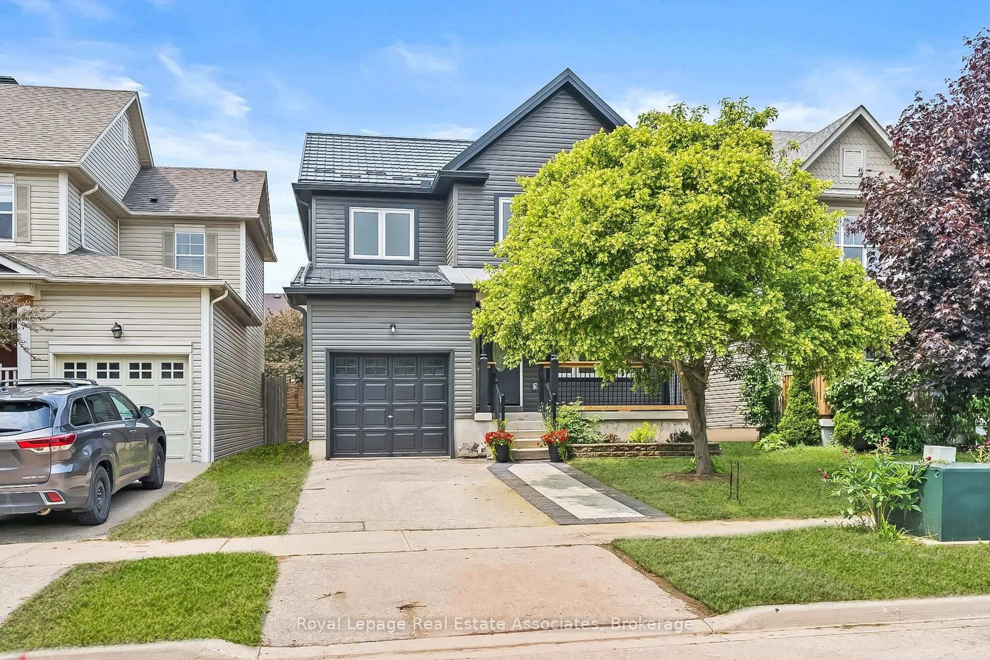 Home with brick exterior material, street for 65 Somerville Rd, Halton Hills Ontario L7J 2Z7