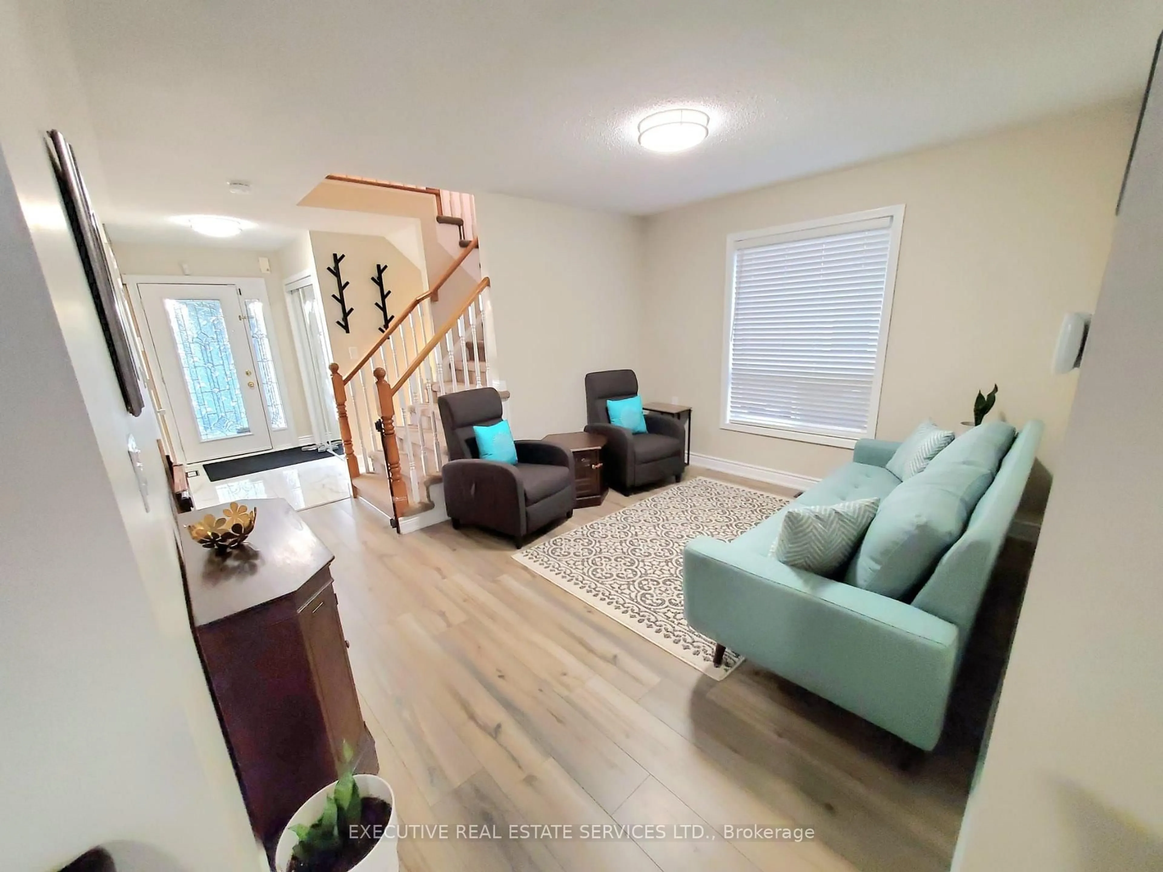 Living room with furniture, unknown for 63 Jessop Dr, Brampton Ontario L7A 3N4