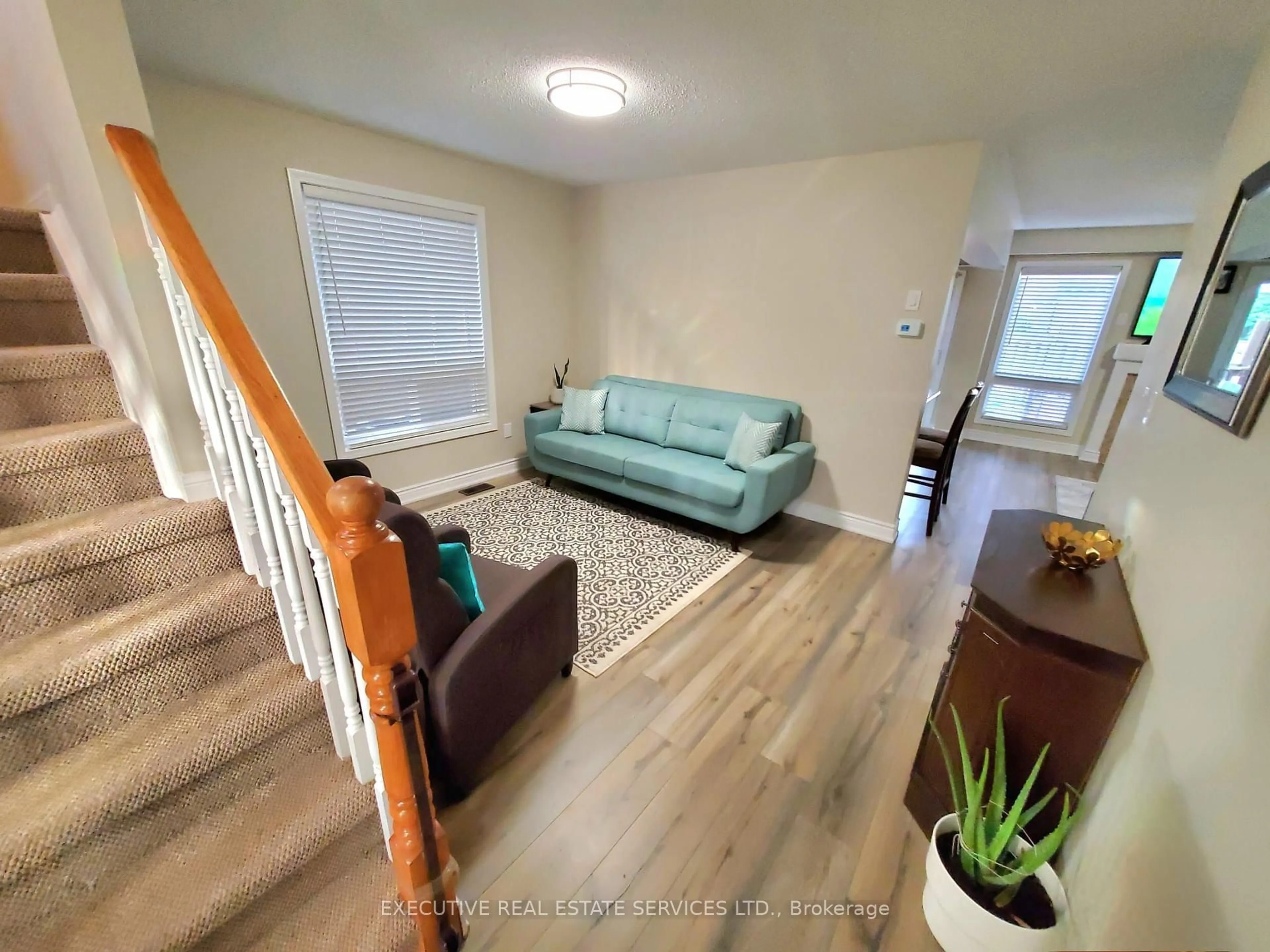 Living room with furniture, unknown for 63 Jessop Dr, Brampton Ontario L7A 3N4