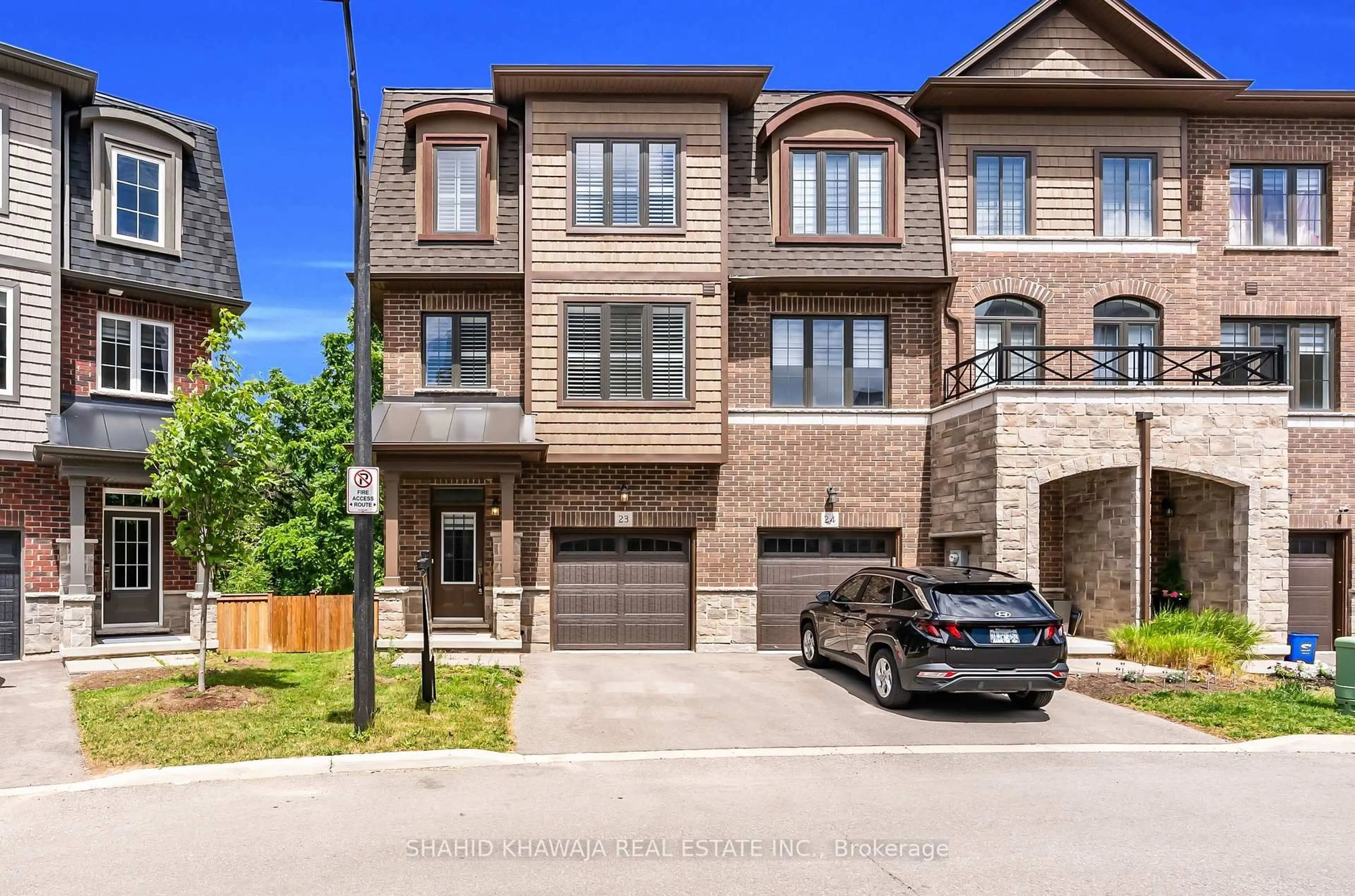 Home with brick exterior material, street for 445 Ontario St #Unit 23, Milton Ontario L9T 9K2