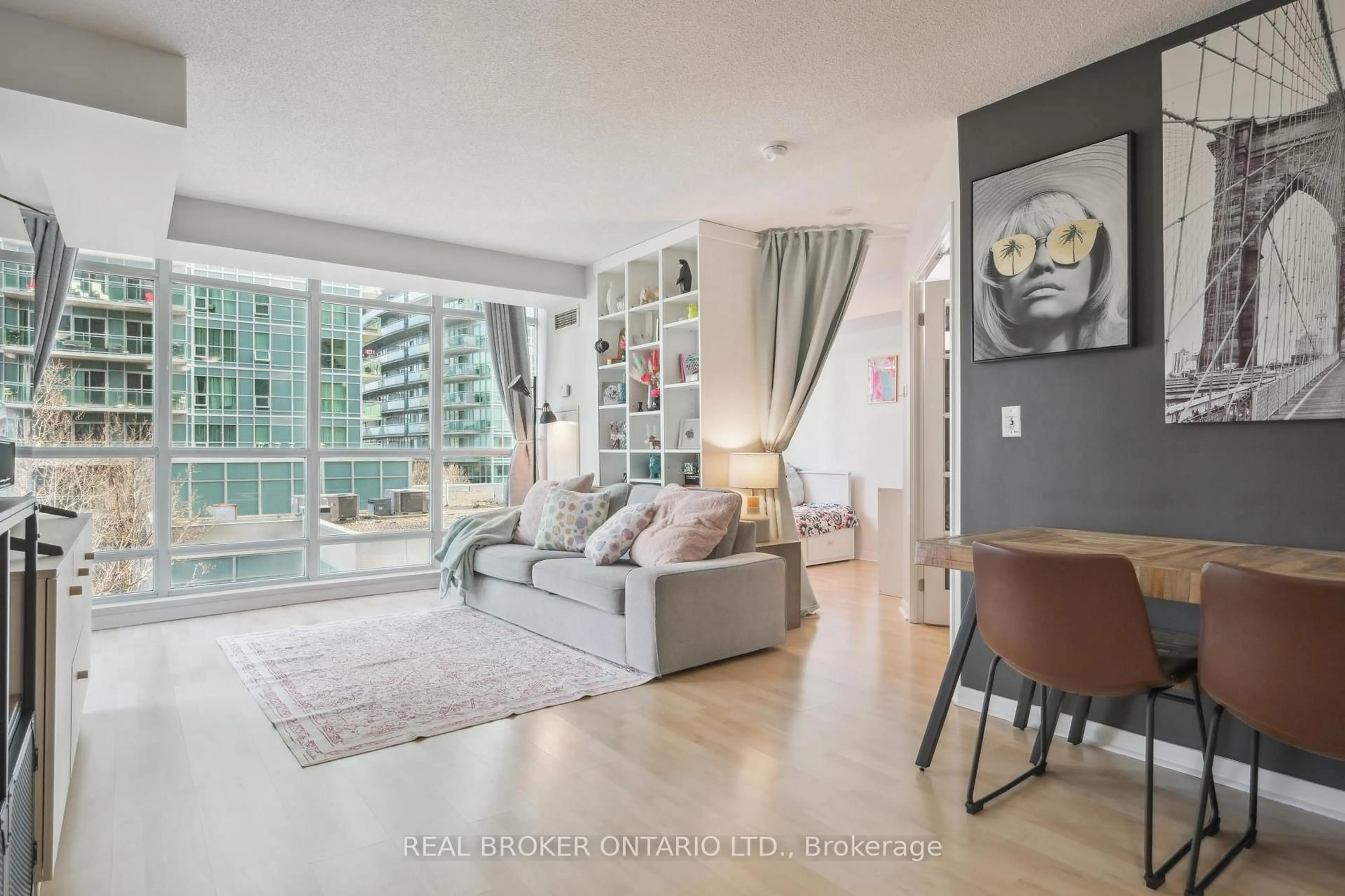 Living room with furniture, unknown for 185 Legion Rd #608, Toronto Ontario M8Y 0A1