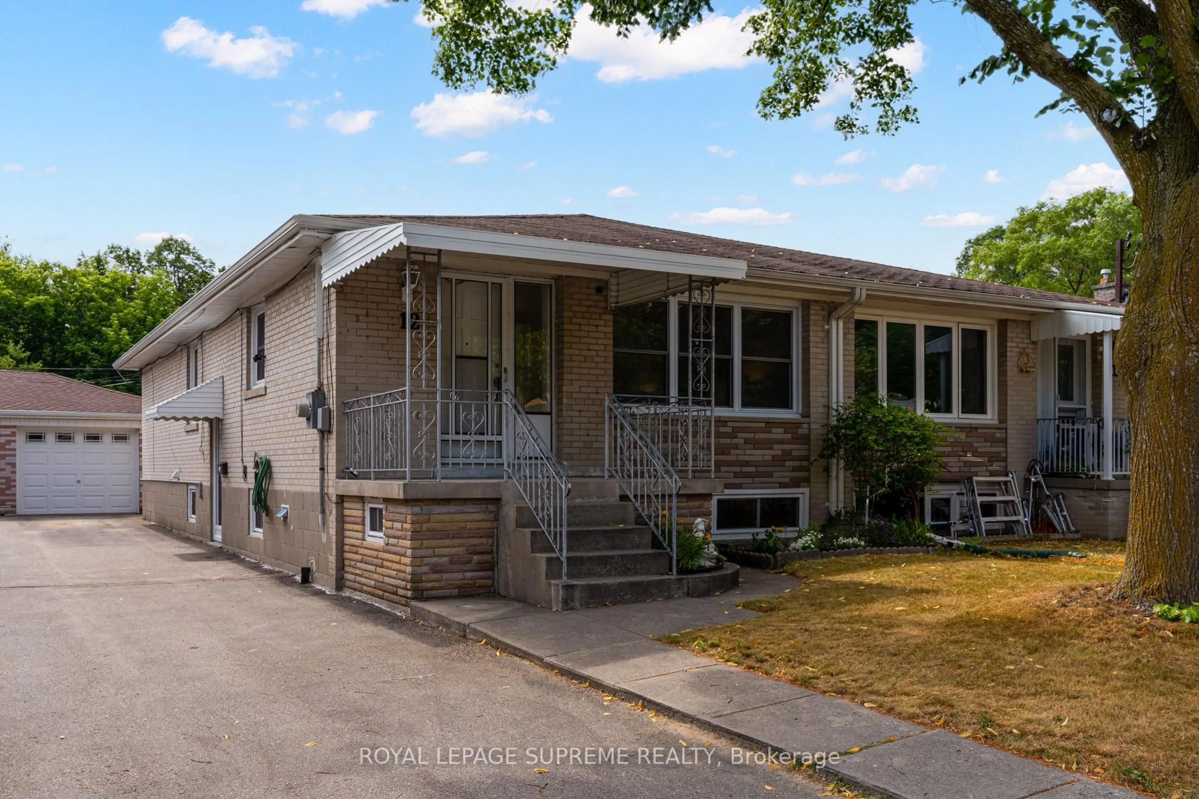 Home with vinyl exterior material, street for 12 Cameo Cres, Toronto Ontario M6N 2K5