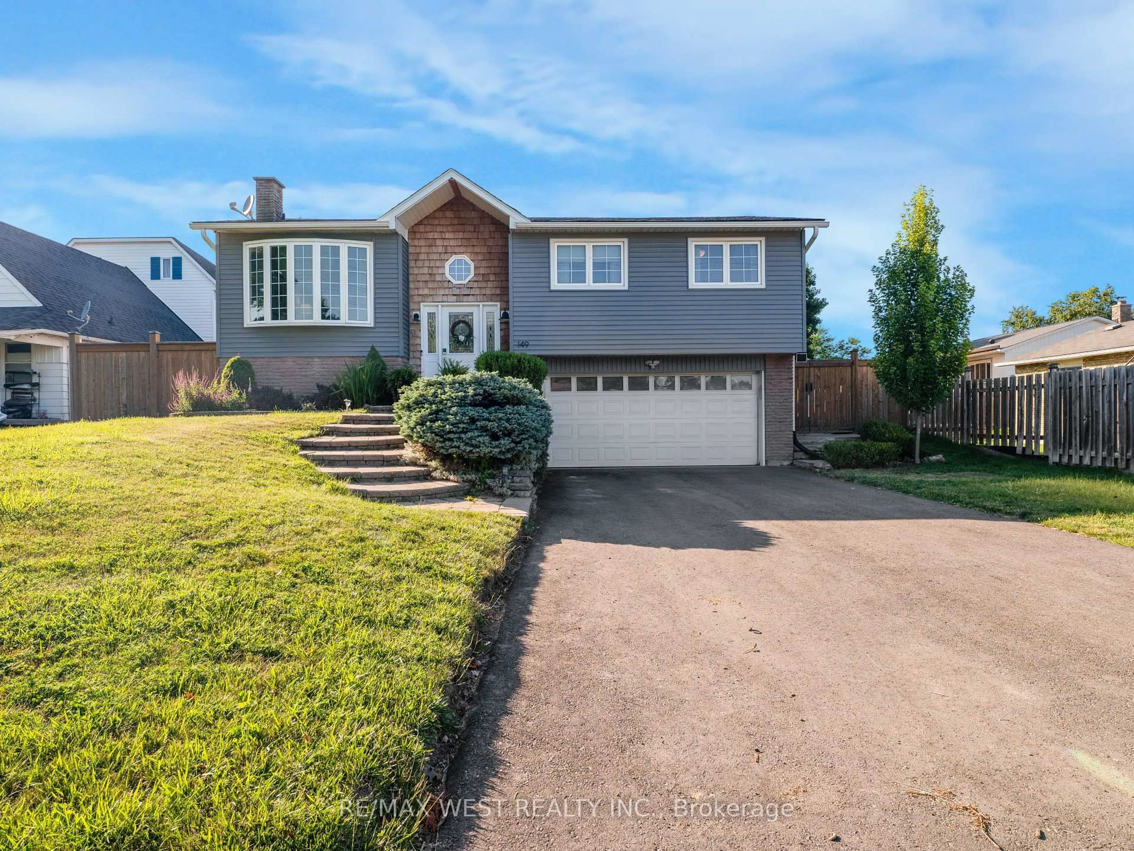 Home with vinyl exterior material, street for 149 Ellwood Dr, Caledon Ontario L7E 4W5