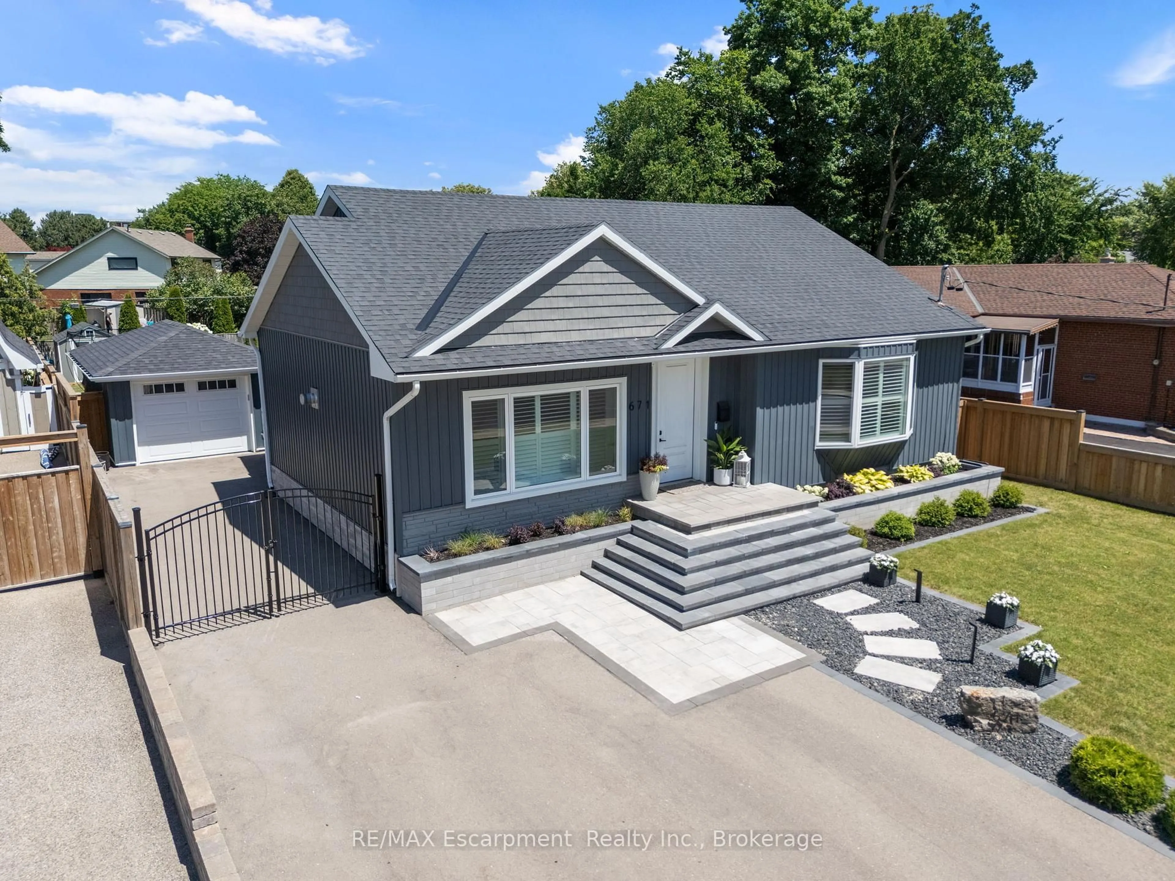A pic from outside/outdoor area/front of a property/back of a property/a pic from drone, street for 671 Peele Blvd, Burlington Ontario L7R 3B8