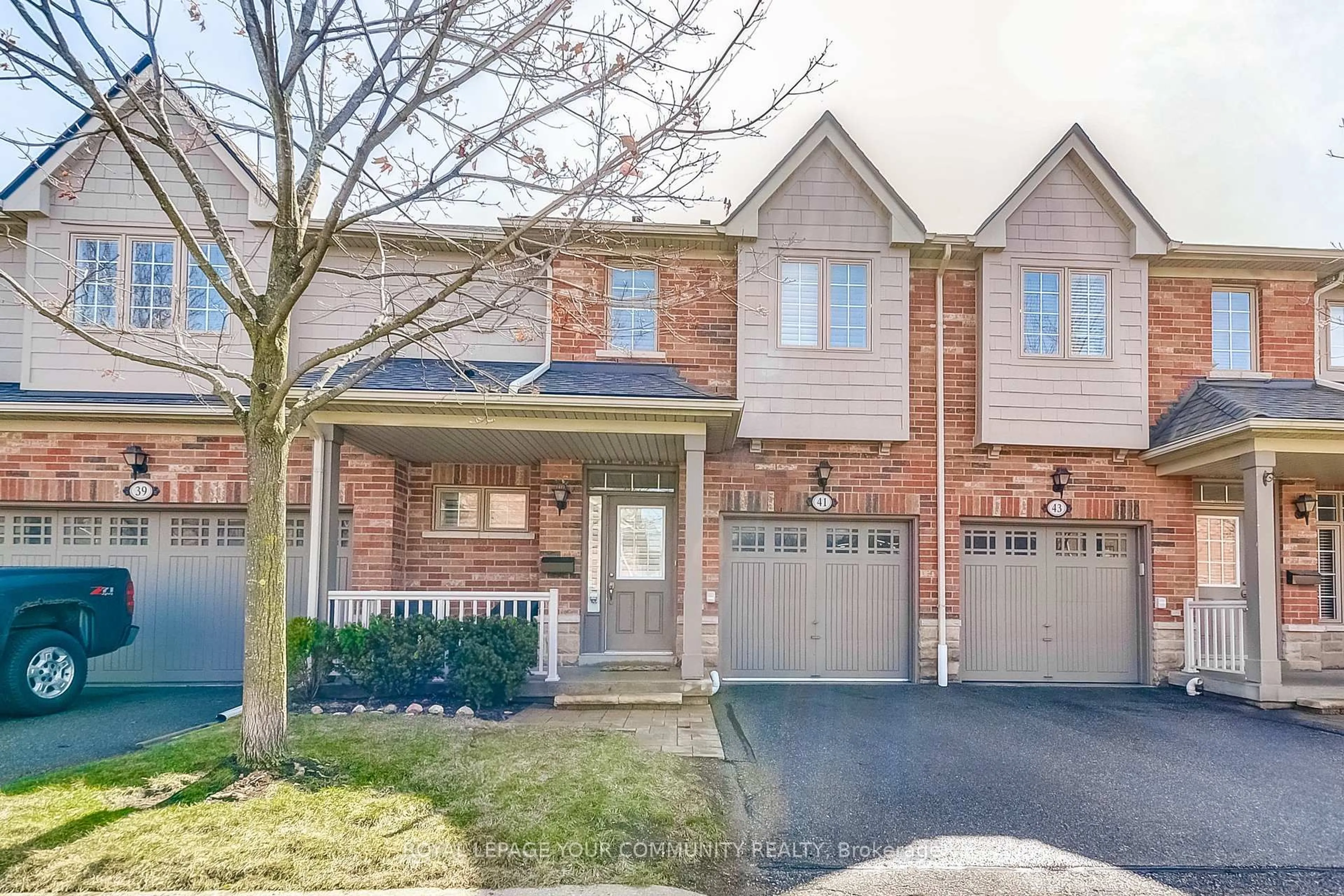 Home with brick exterior material, street for 1633 Northmount Ave #41, Mississauga Ontario L5E 1Y9