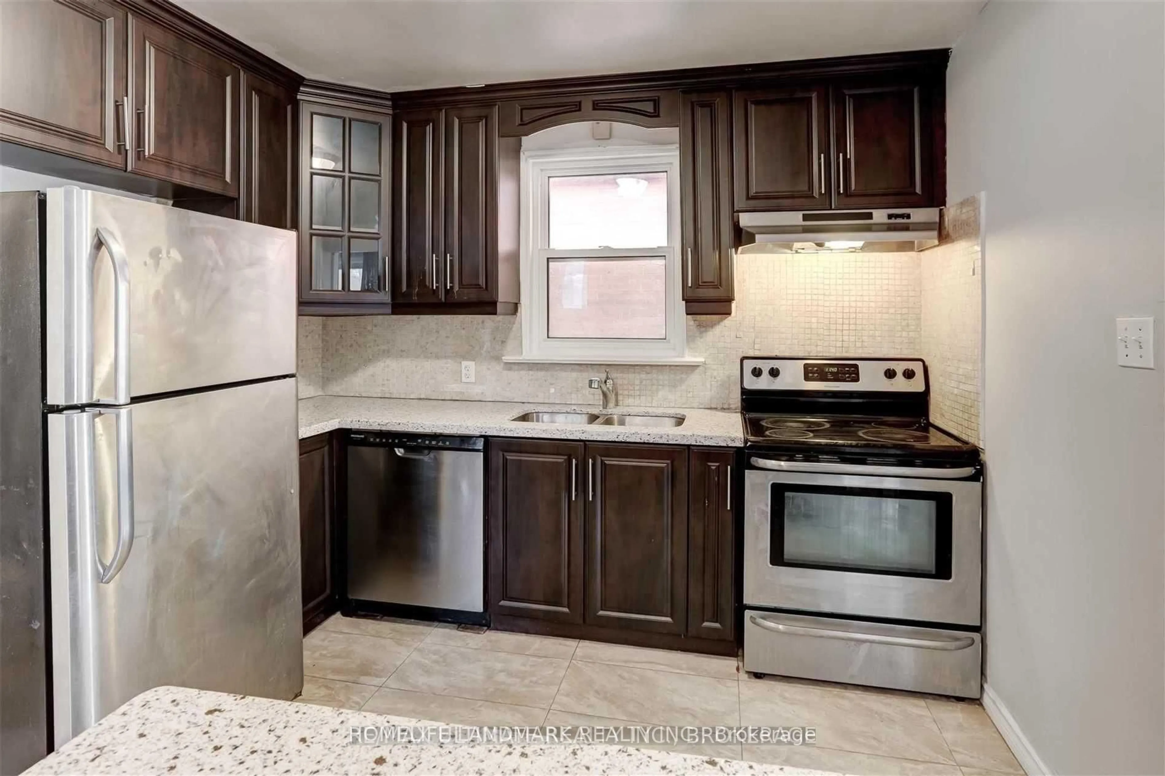 Standard kitchen, ceramic/tile floor for 67 Bala Ave, Toronto Ontario M6M 2E2