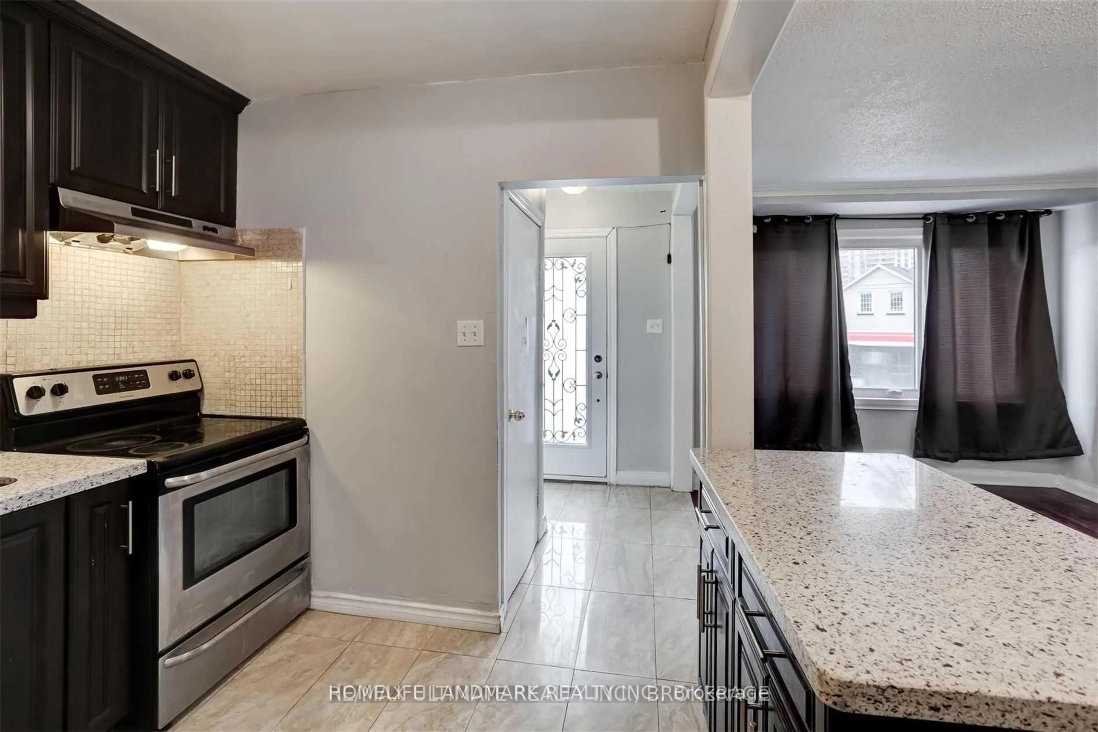 Open concept kitchen, ceramic/tile floor for 67 Bala Ave, Toronto Ontario M6M 2E2