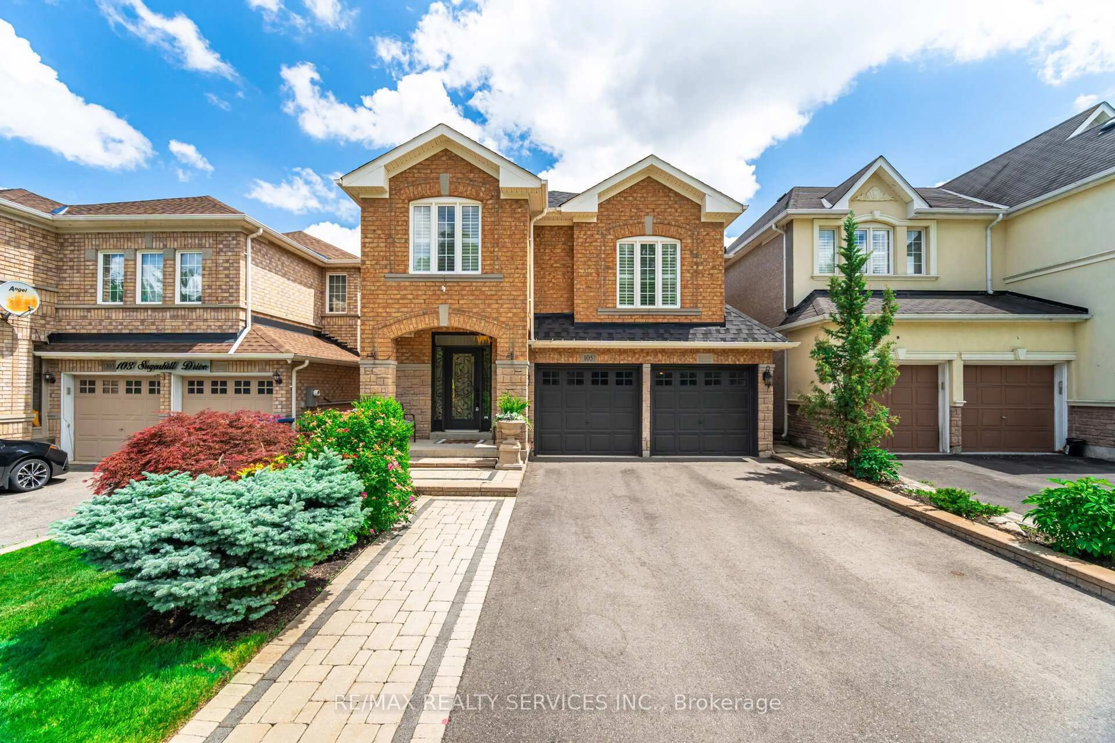Home with brick exterior material, street for 105 Sugarhill Dr, Brampton Ontario L7A 3X3