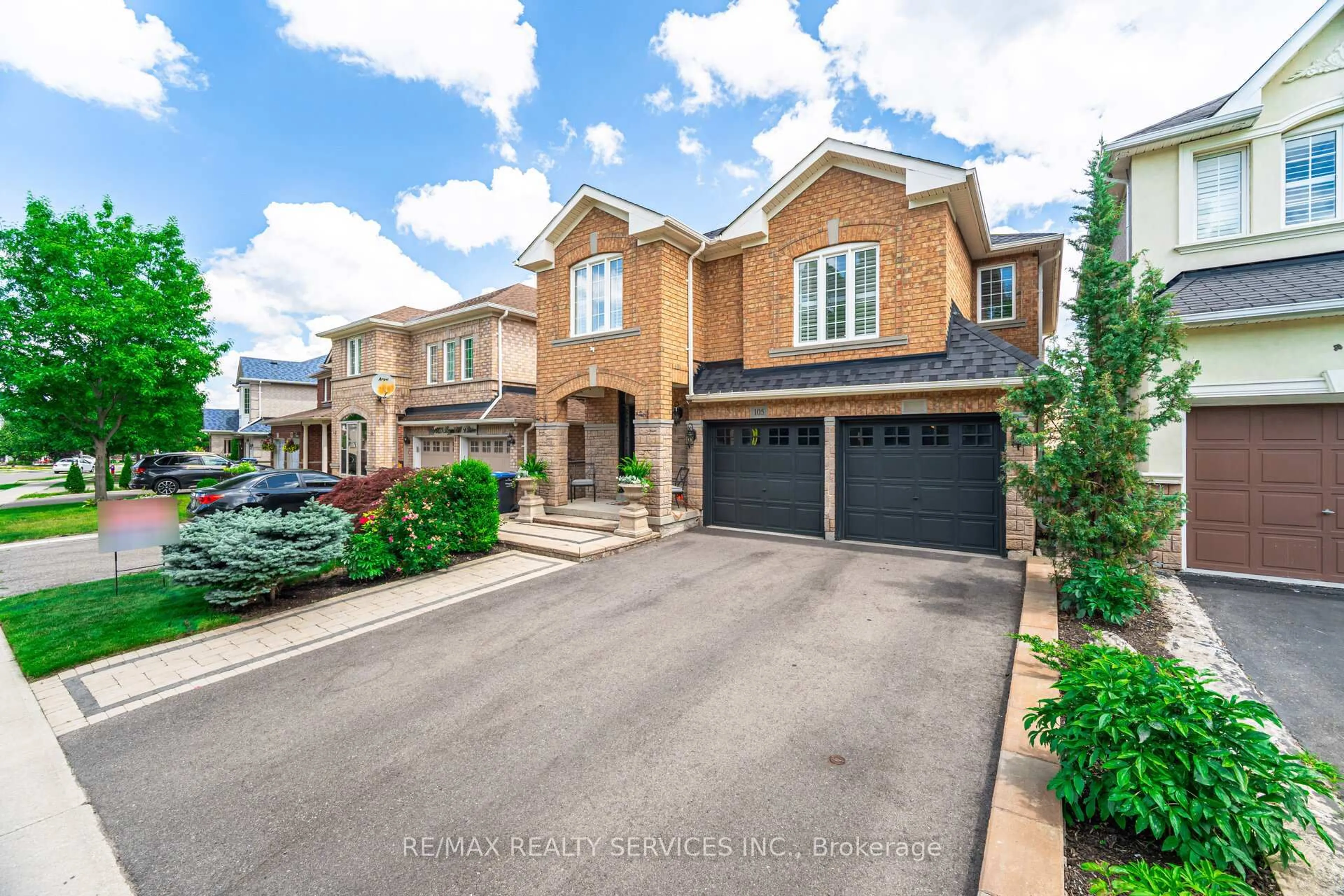 Home with brick exterior material, street for 105 Sugarhill Dr, Brampton Ontario L7A 3X3