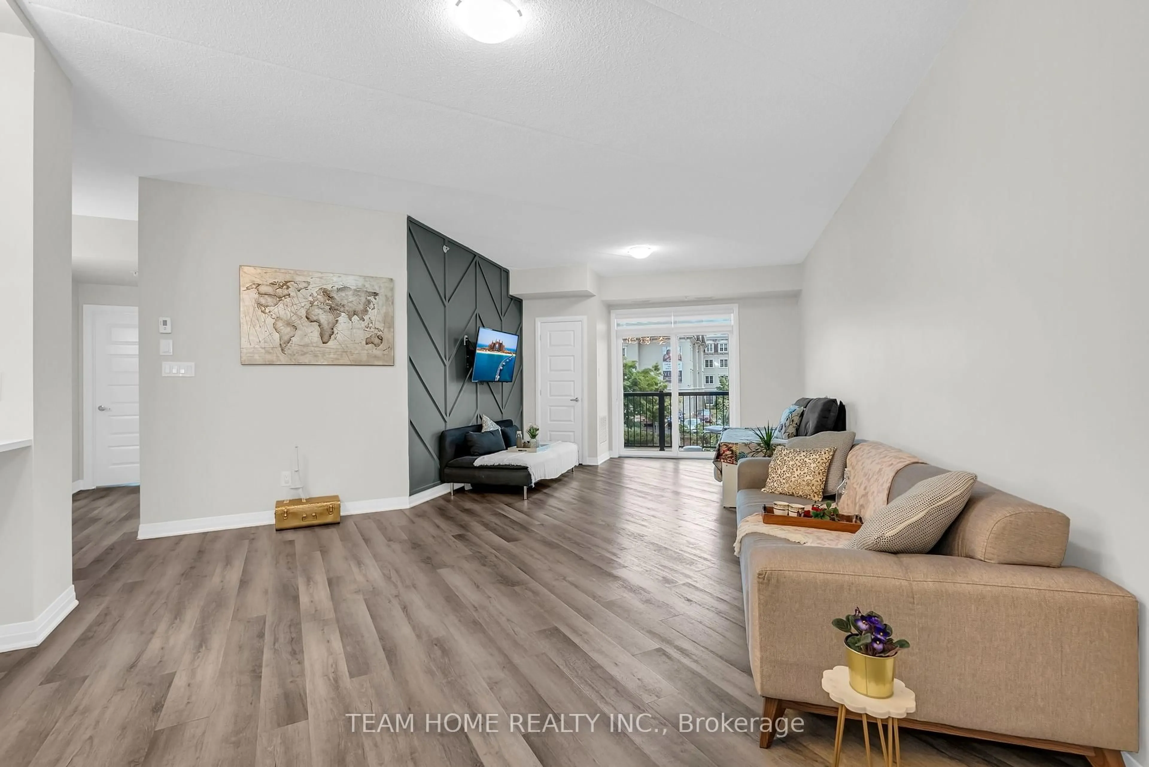 Living room with furniture, unknown for 610 Farmstead Dr #220, Milton Ontario L9T 8X5