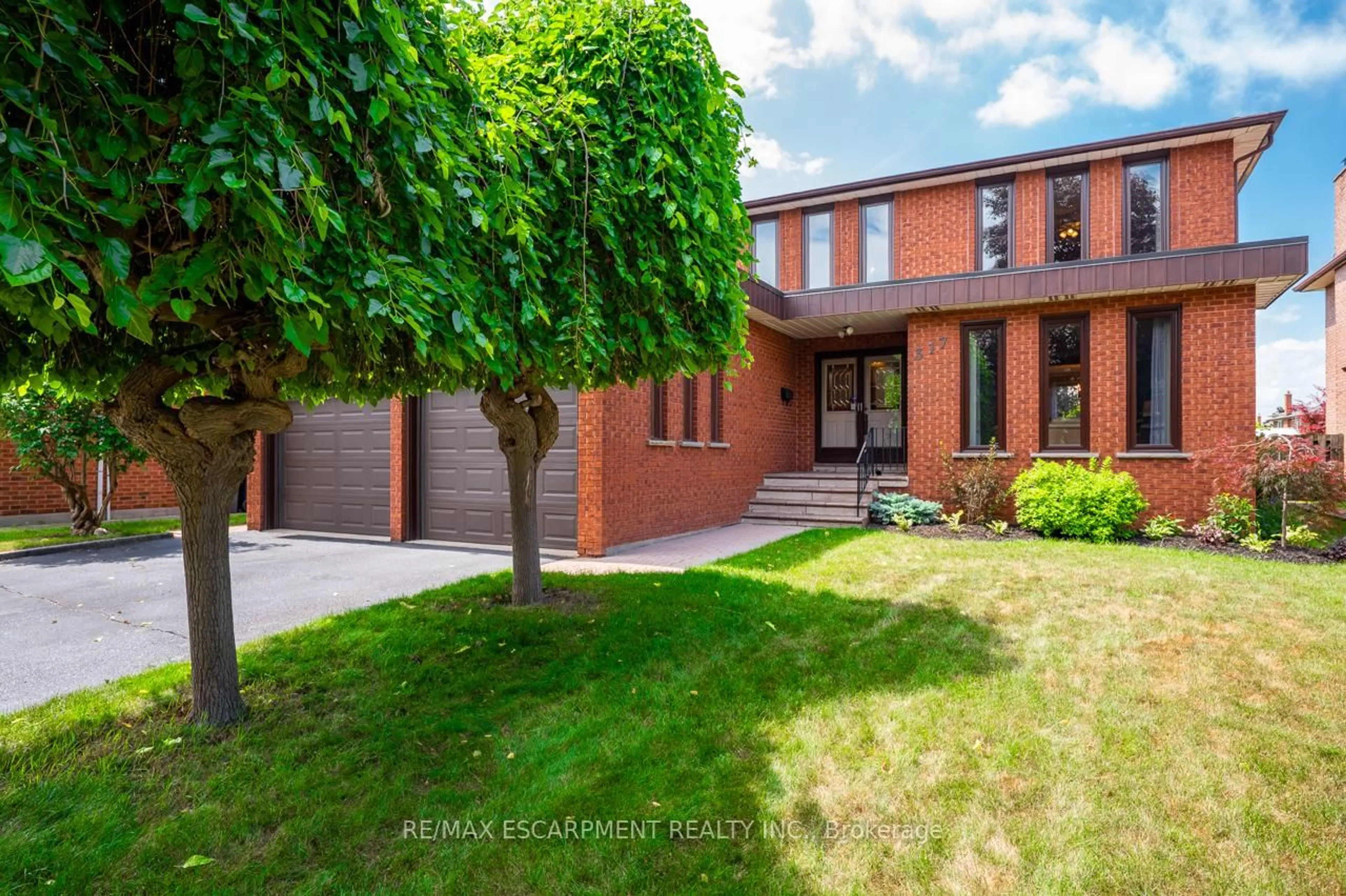 Home with brick exterior material, street for 317 Creelman Rd, Mississauga Ontario L5A 4A6