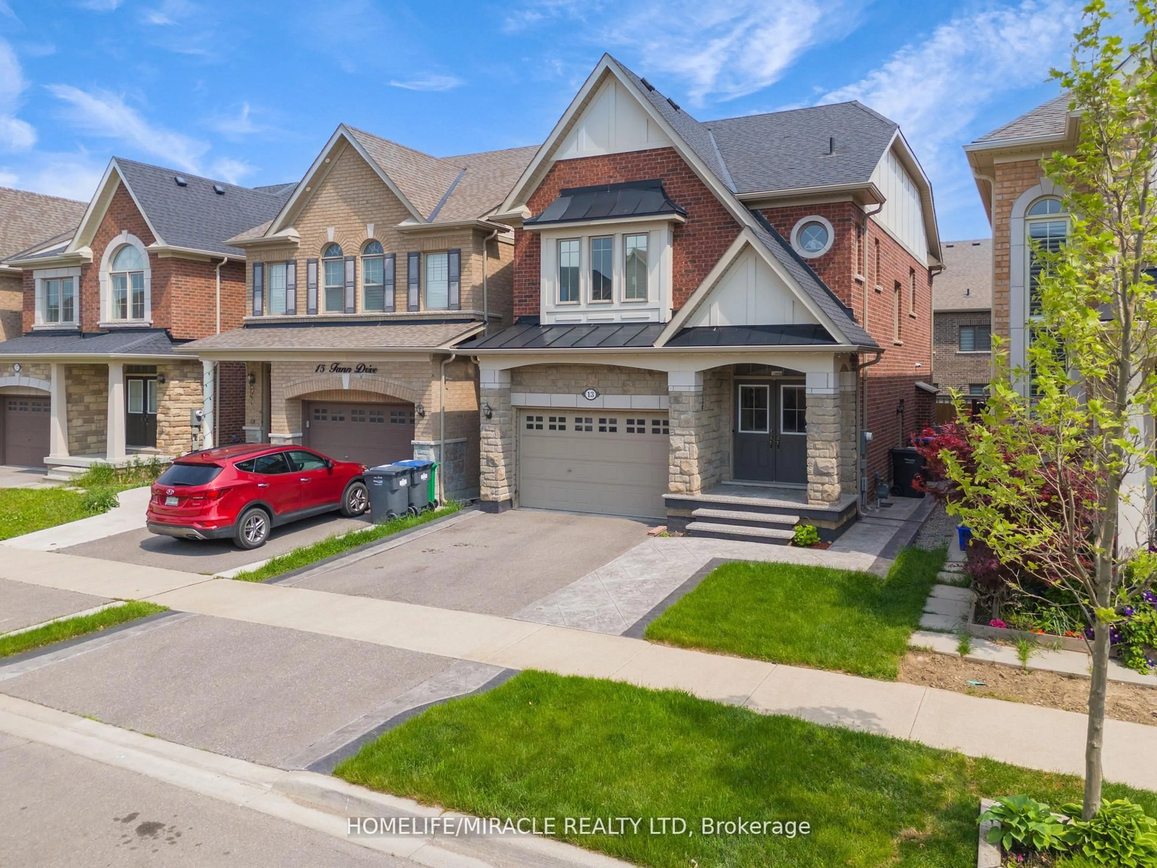 Home with brick exterior material, street for 13 Fann Dr, Brampton Ontario L7A 4L4