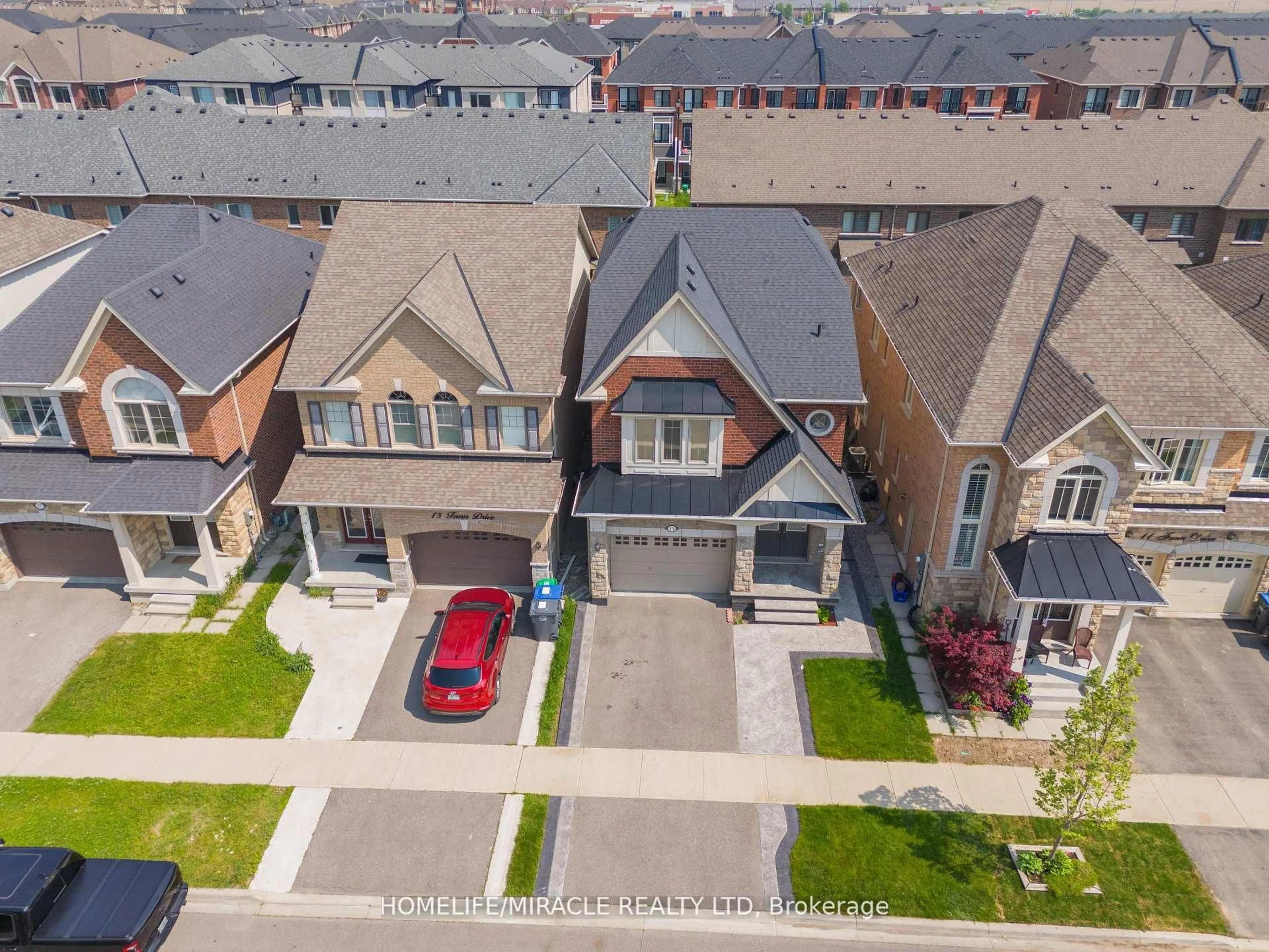 A pic from outside/outdoor area/front of a property/back of a property/a pic from drone, street for 13 Fann Dr, Brampton Ontario L7A 4L4