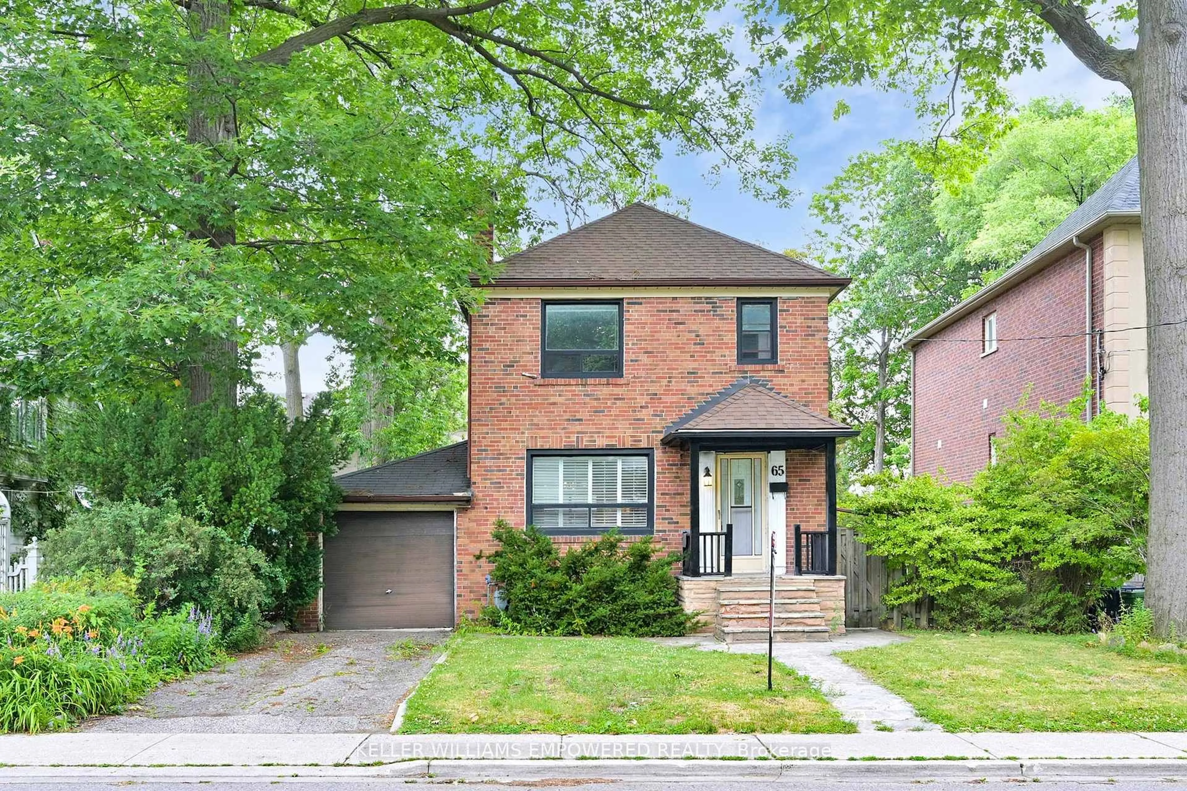 Home with brick exterior material, street for 65 Long Branch Ave, Toronto Ontario M8W 3J3