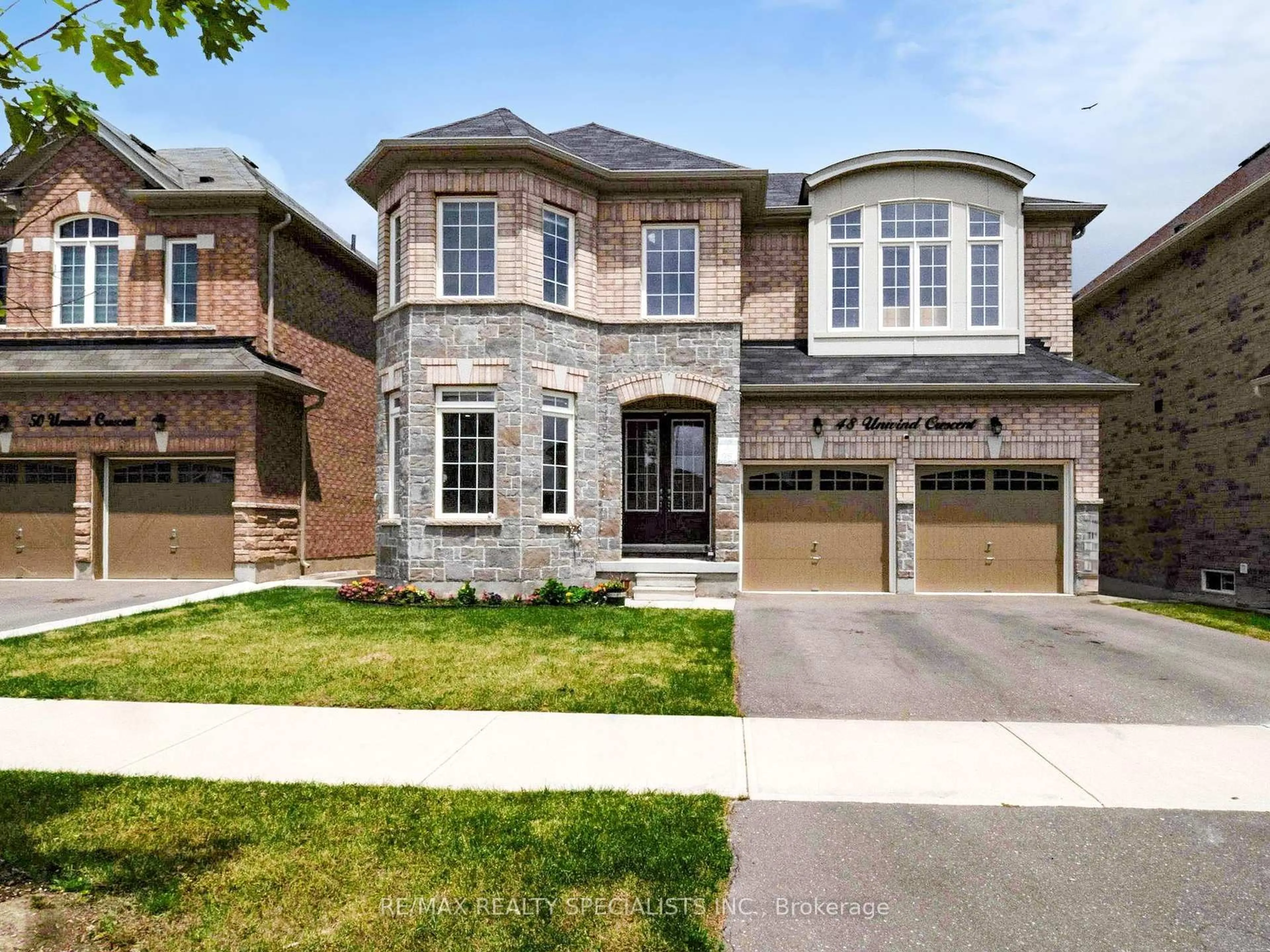 Home with brick exterior material, street for 48 Unwind Cres, Brampton Ontario L6X 5J8