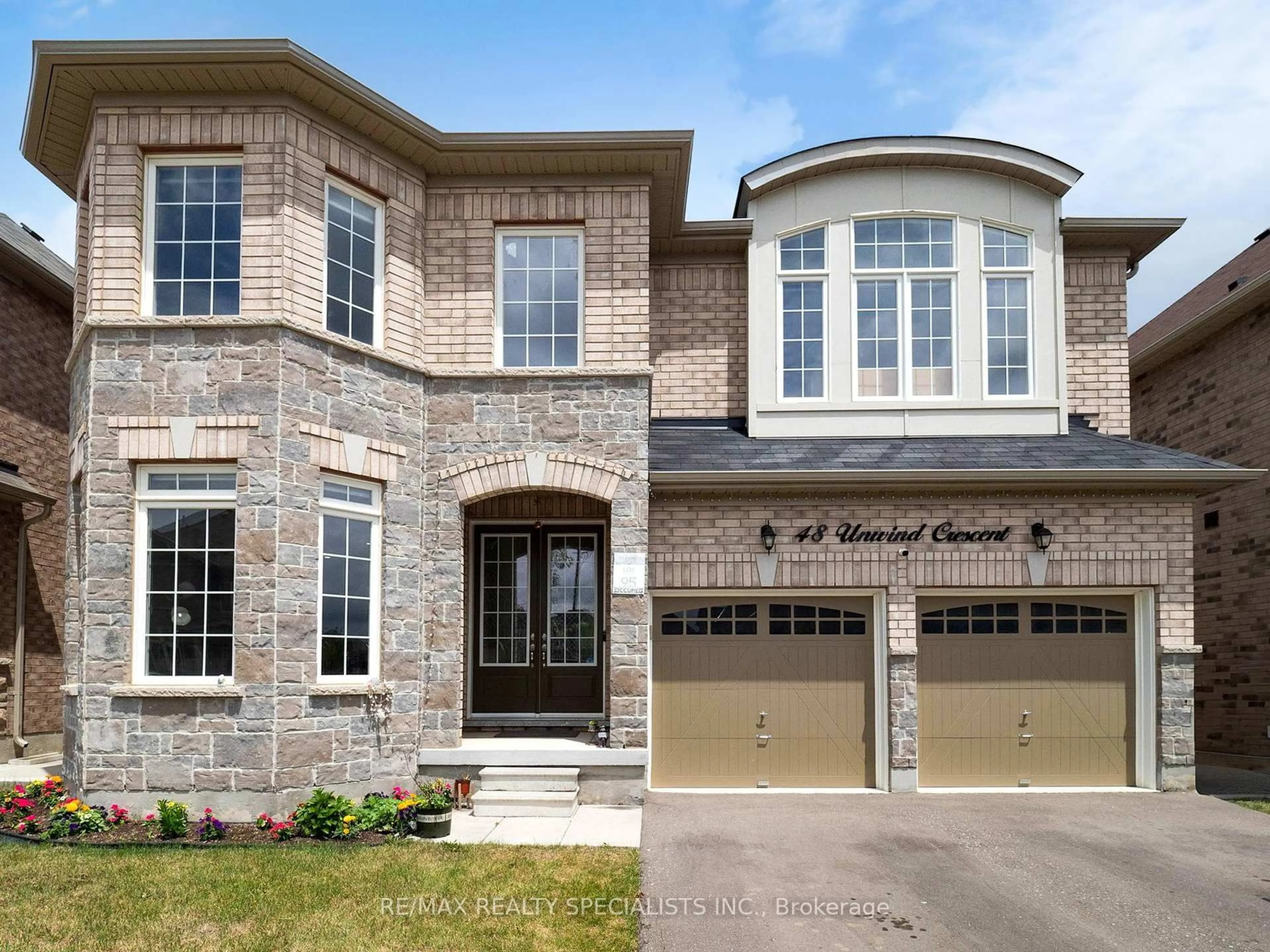 Home with brick exterior material, street for 48 Unwind Cres, Brampton Ontario L6X 5J8