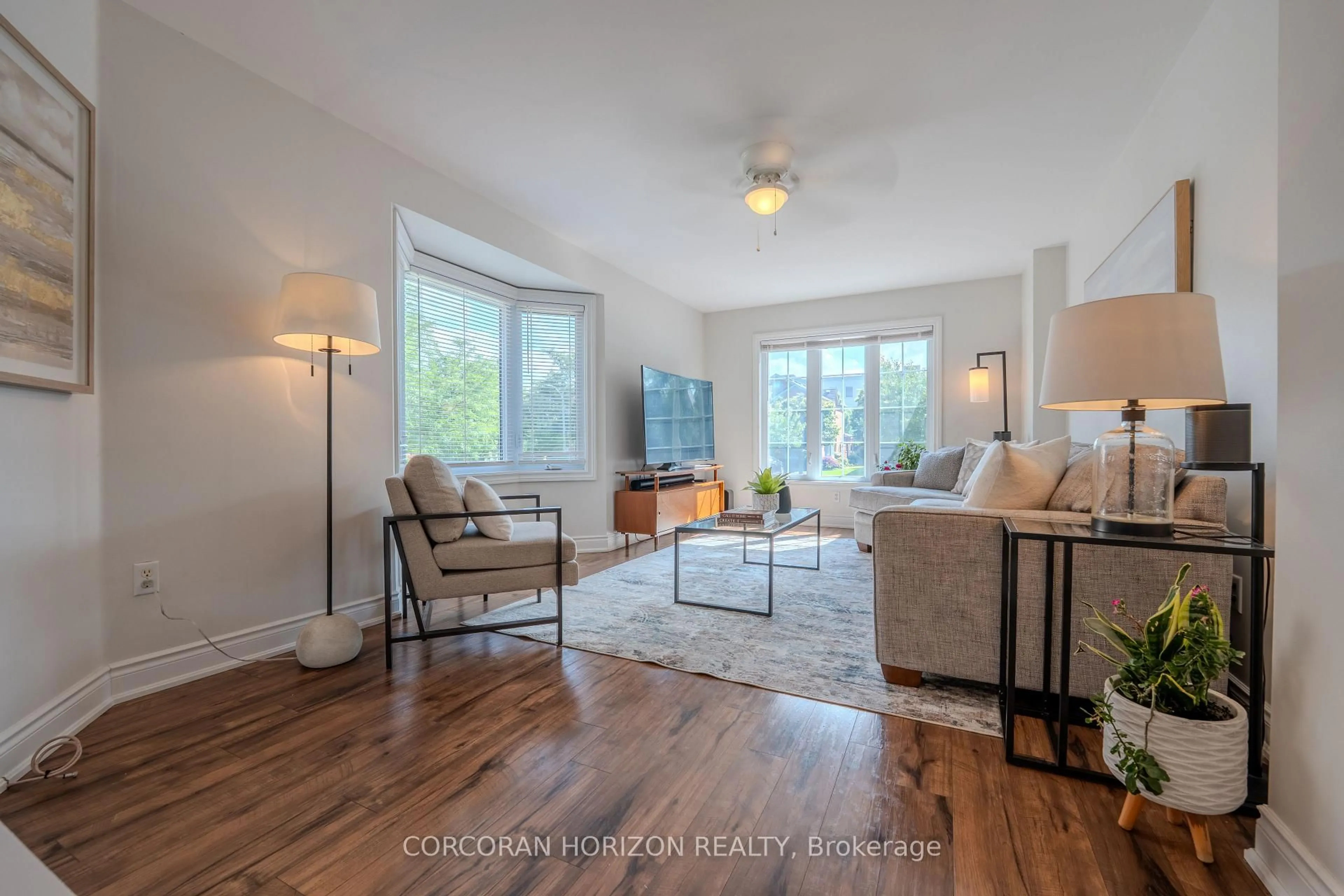Living room with furniture, wood/laminate floor for 2963 Jackson Dr, Burlington Ontario L7M 4K6